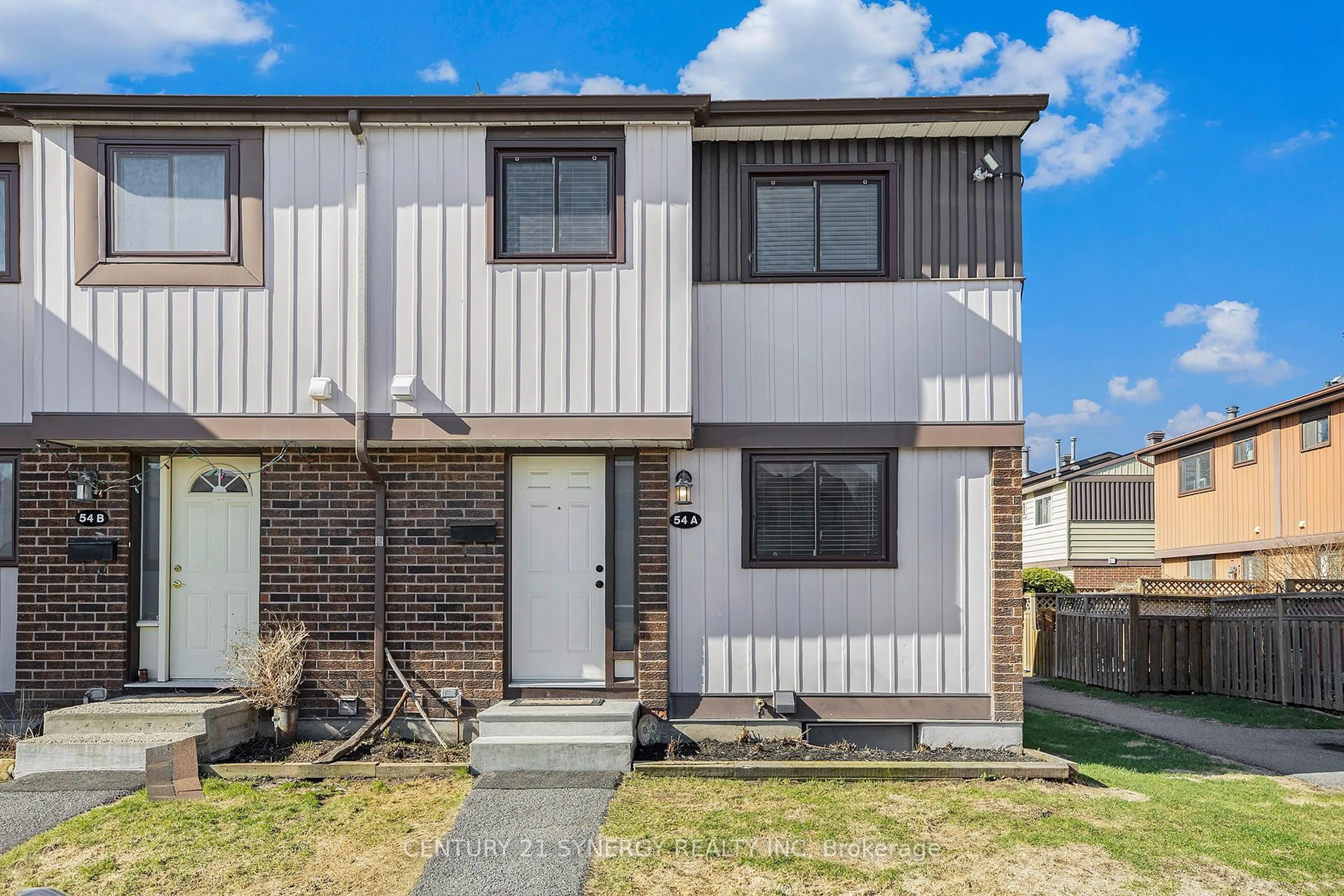 Home with vinyl exterior material, street for 54-A Foxfield Dr, Ottawa Ontario K2J 1P7