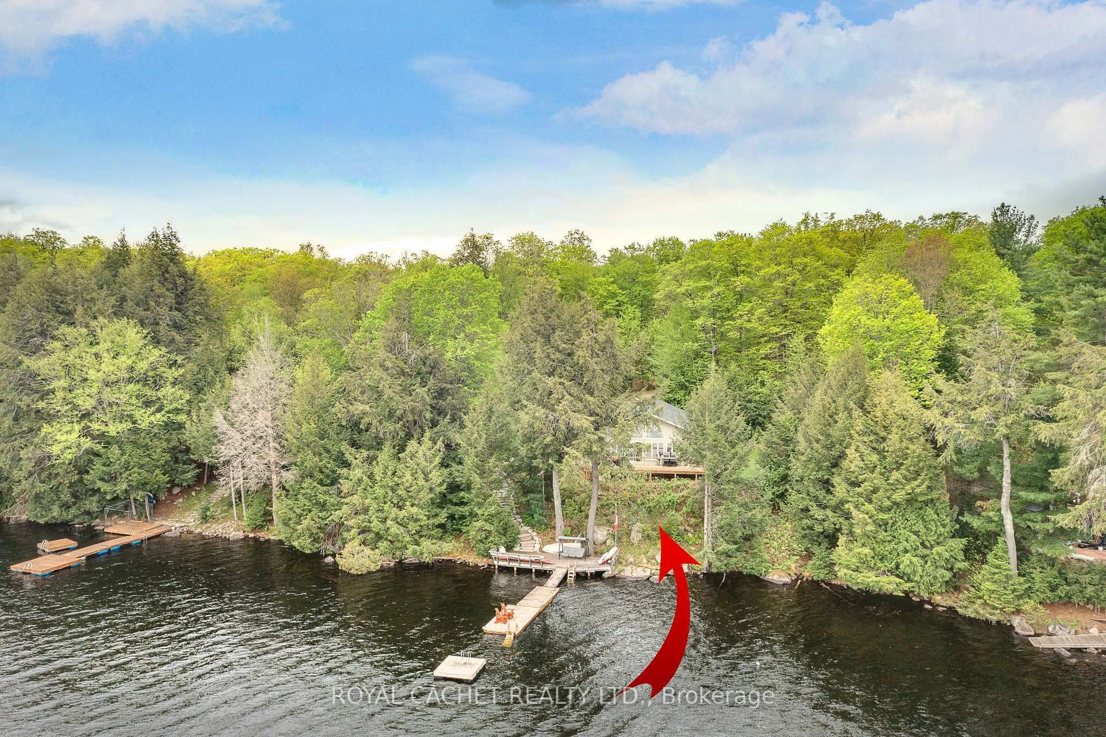 A pic from outside/outdoor area/front of a property/back of a property/a pic from drone, water/lake/river/ocean view for 1221 Stormy Lake Rd, Highlands East Ontario K0M 1S0