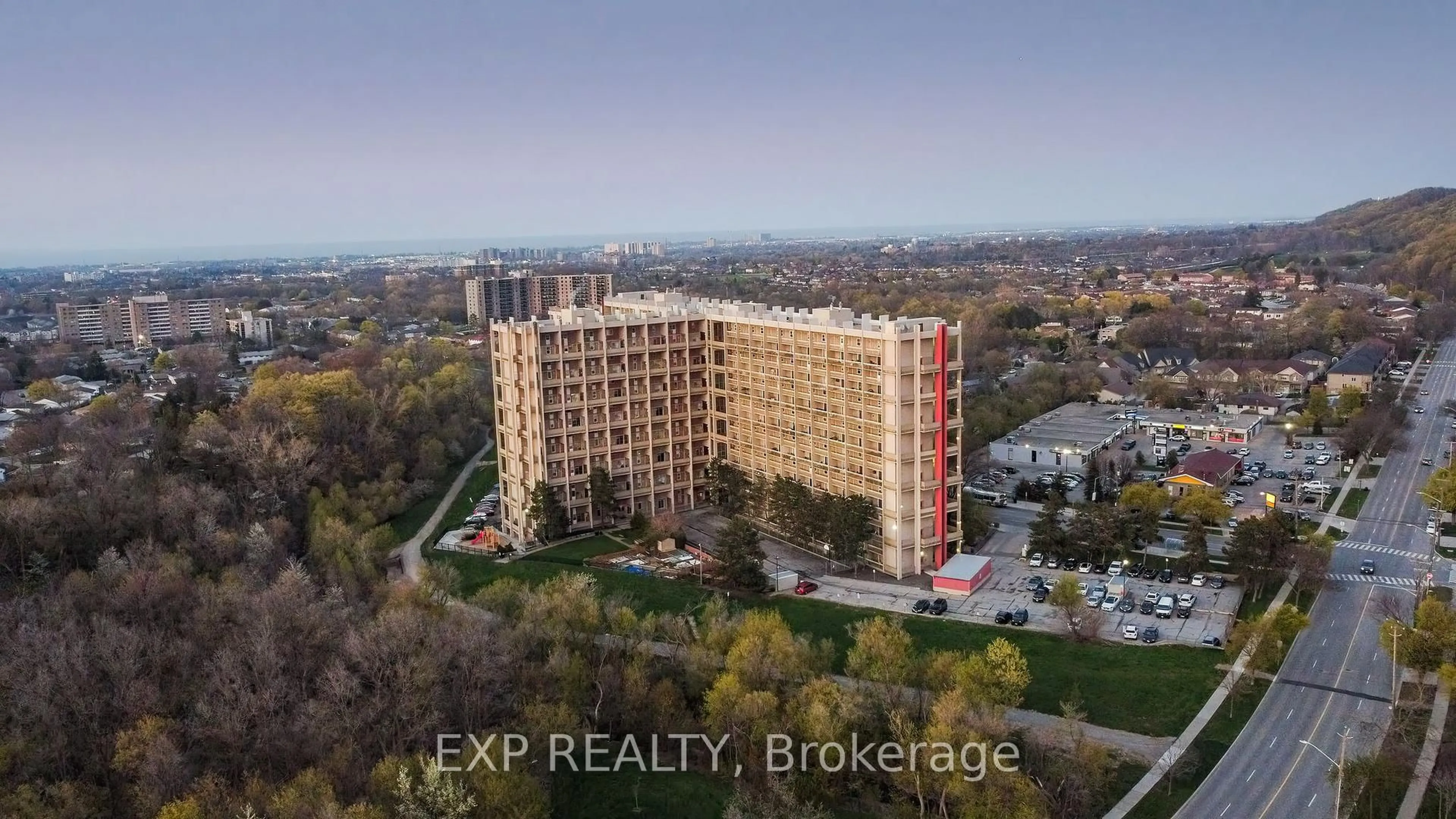 A pic from outside/outdoor area/front of a property/back of a property/a pic from drone, building for 350 Quigley Rd #836, Hamilton Ontario L8K 5N2