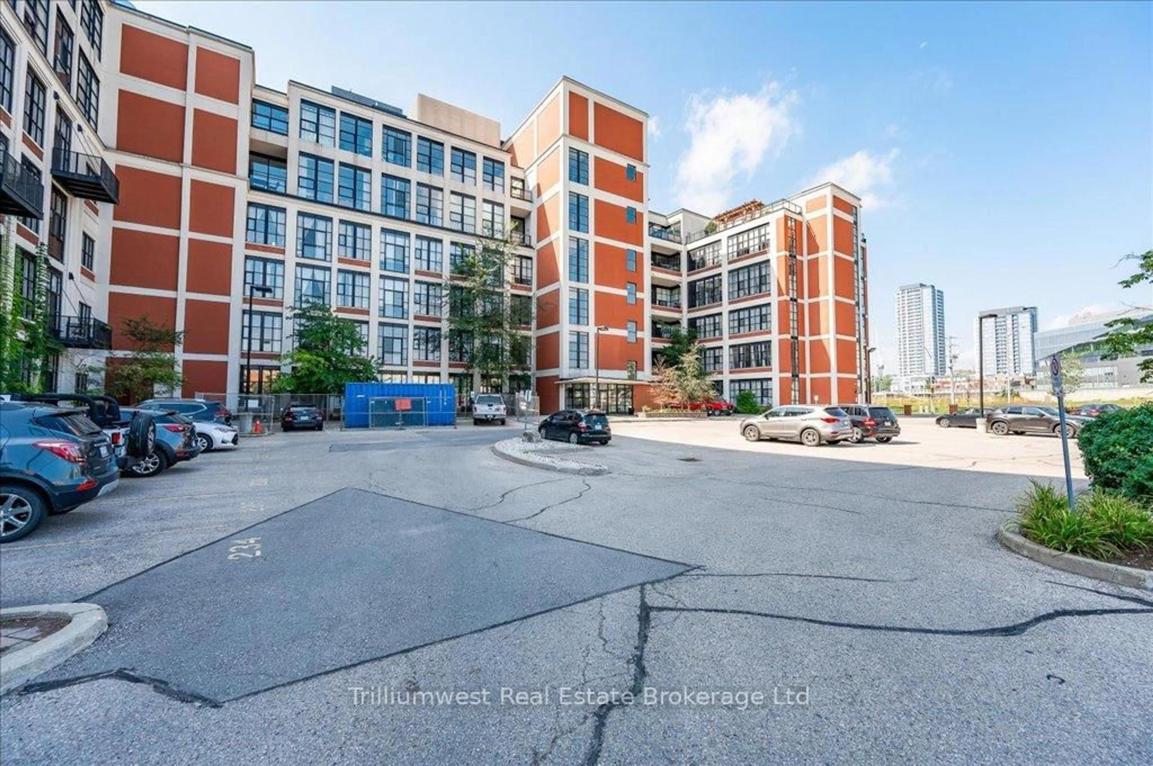 A pic from outside/outdoor area/front of a property/back of a property/a pic from drone, unknown for 410 King St #222, Kitchener Ontario N2G 1C3
