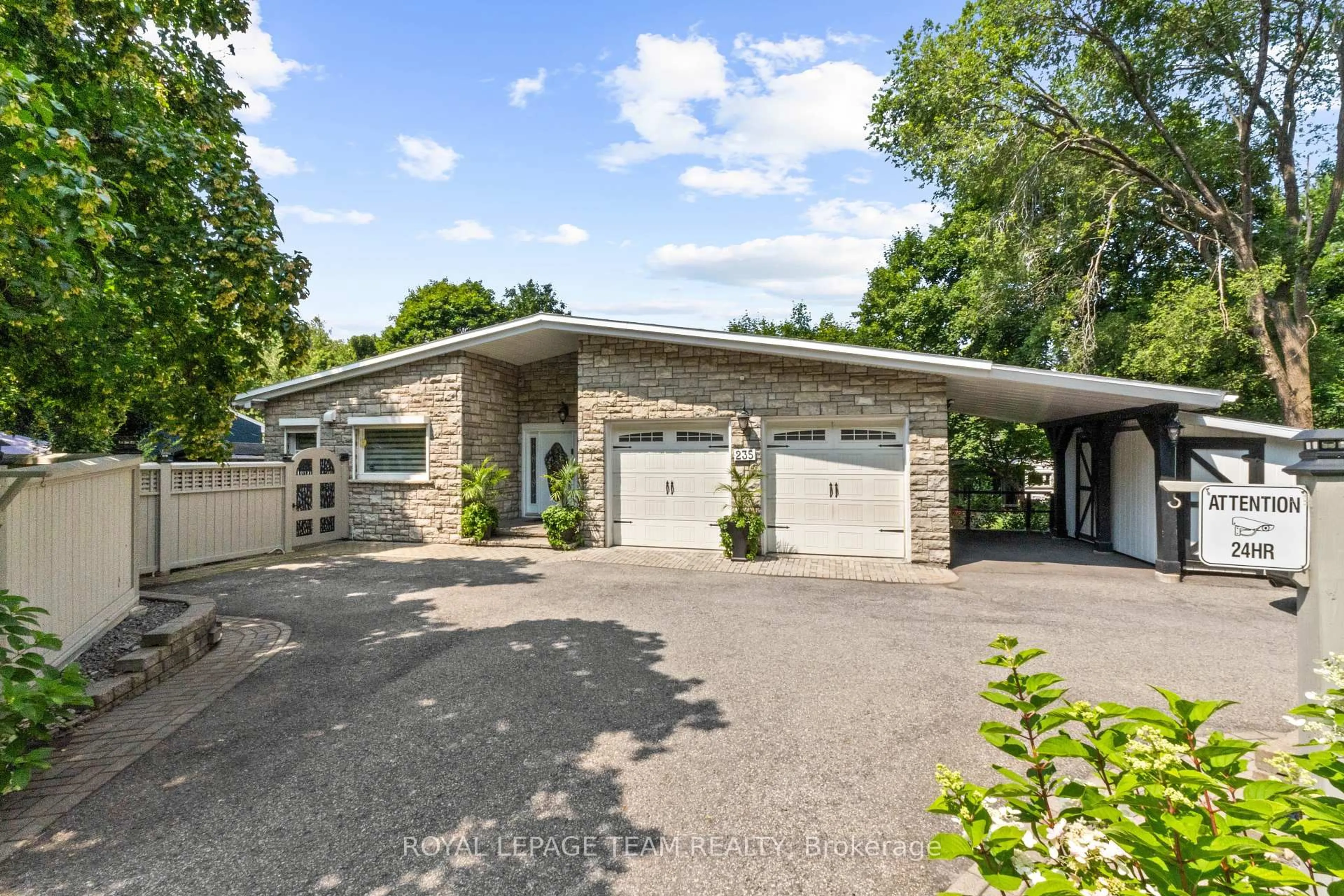 Home with brick exterior material, street for 235 Hemlock Rd, Ottawa Ontario K1M 1K4