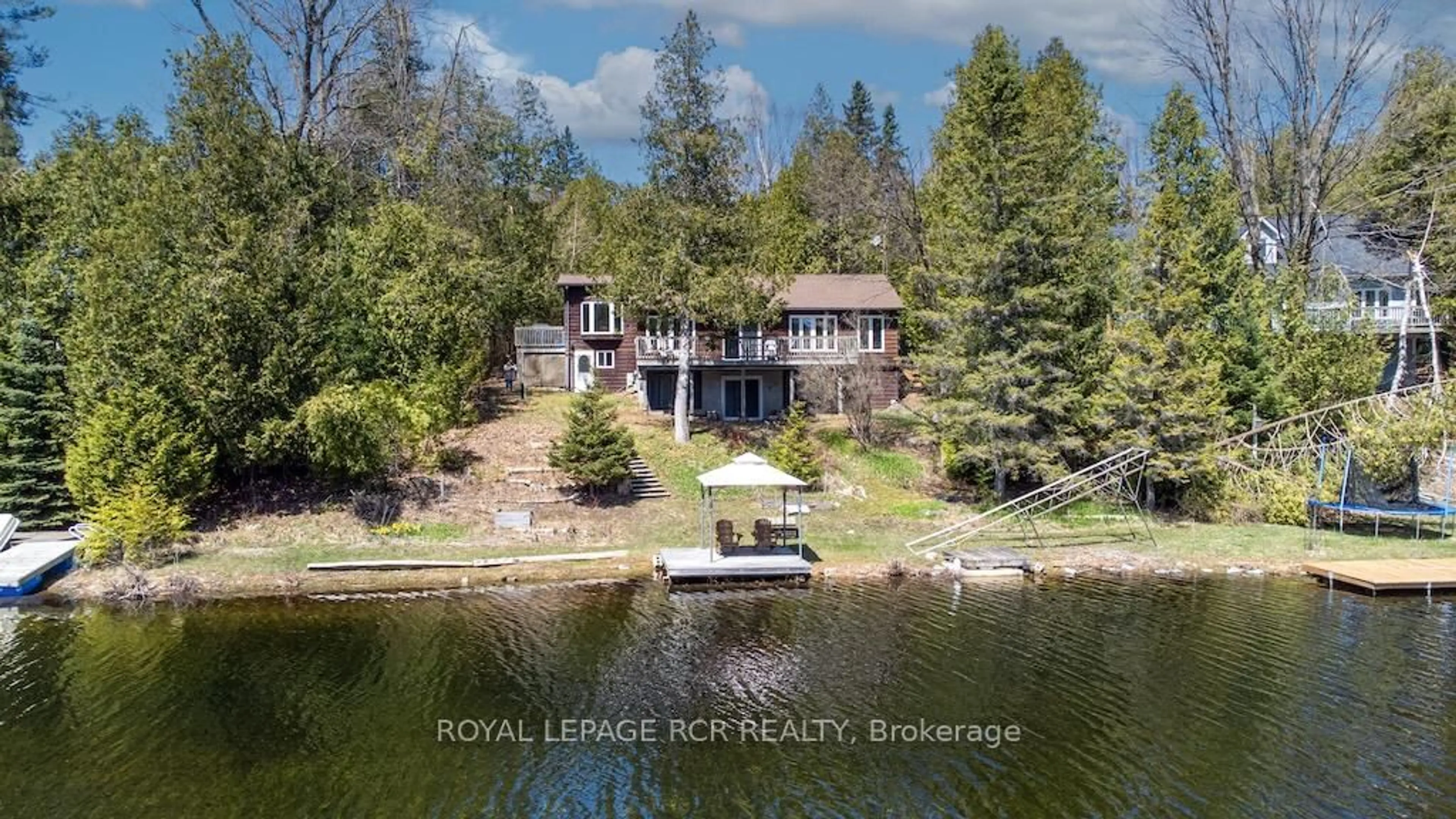 A pic from outside/outdoor area/front of a property/back of a property/a pic from drone, water/lake/river/ocean view for 24 Juniper Cres, Kawartha Lakes Ontario K0M 1C0