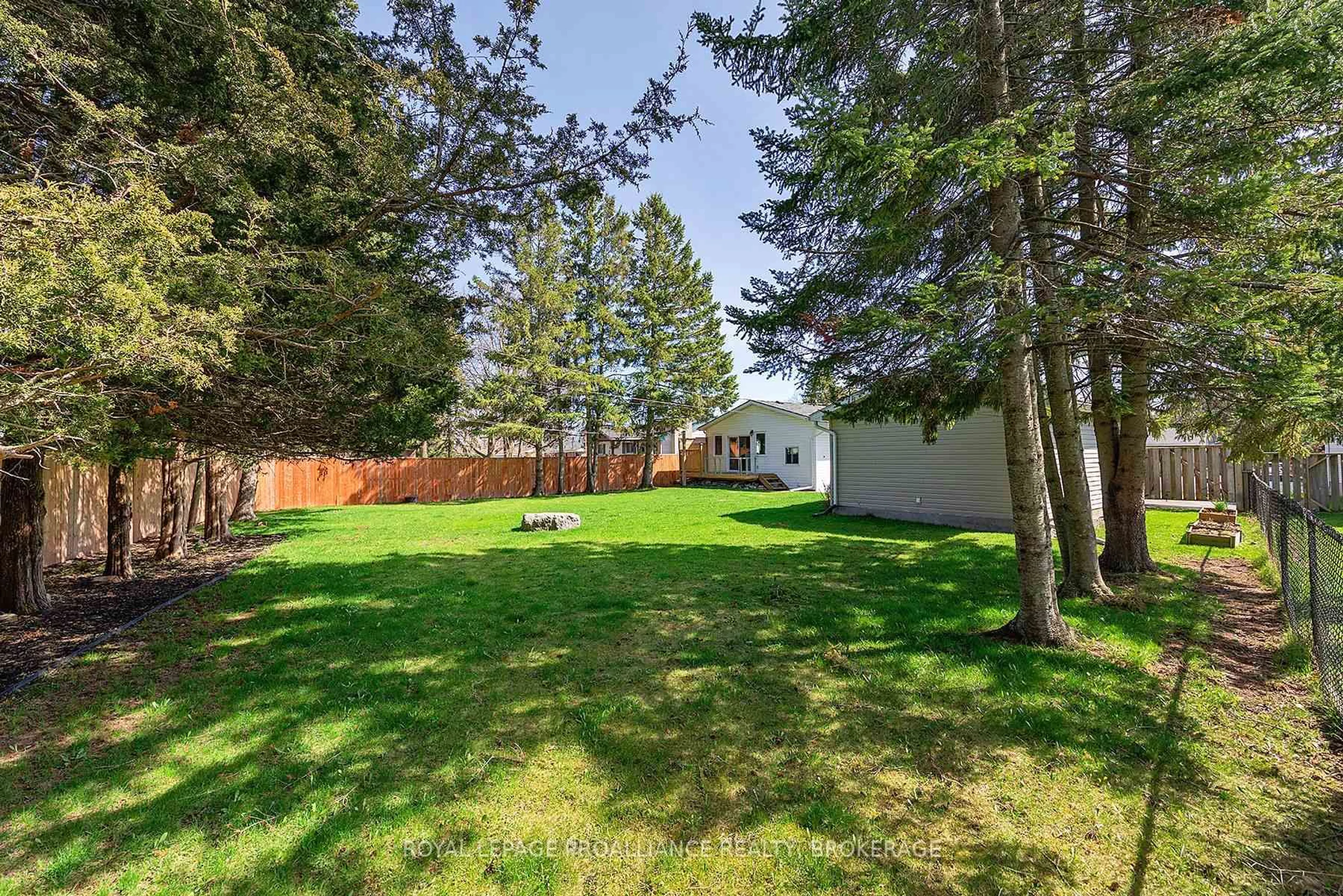 A pic from outside/outdoor area/front of a property/back of a property/a pic from drone, forest/trees view for 1084 Lincoln Dr, Kingston Ontario K7M 4Z4