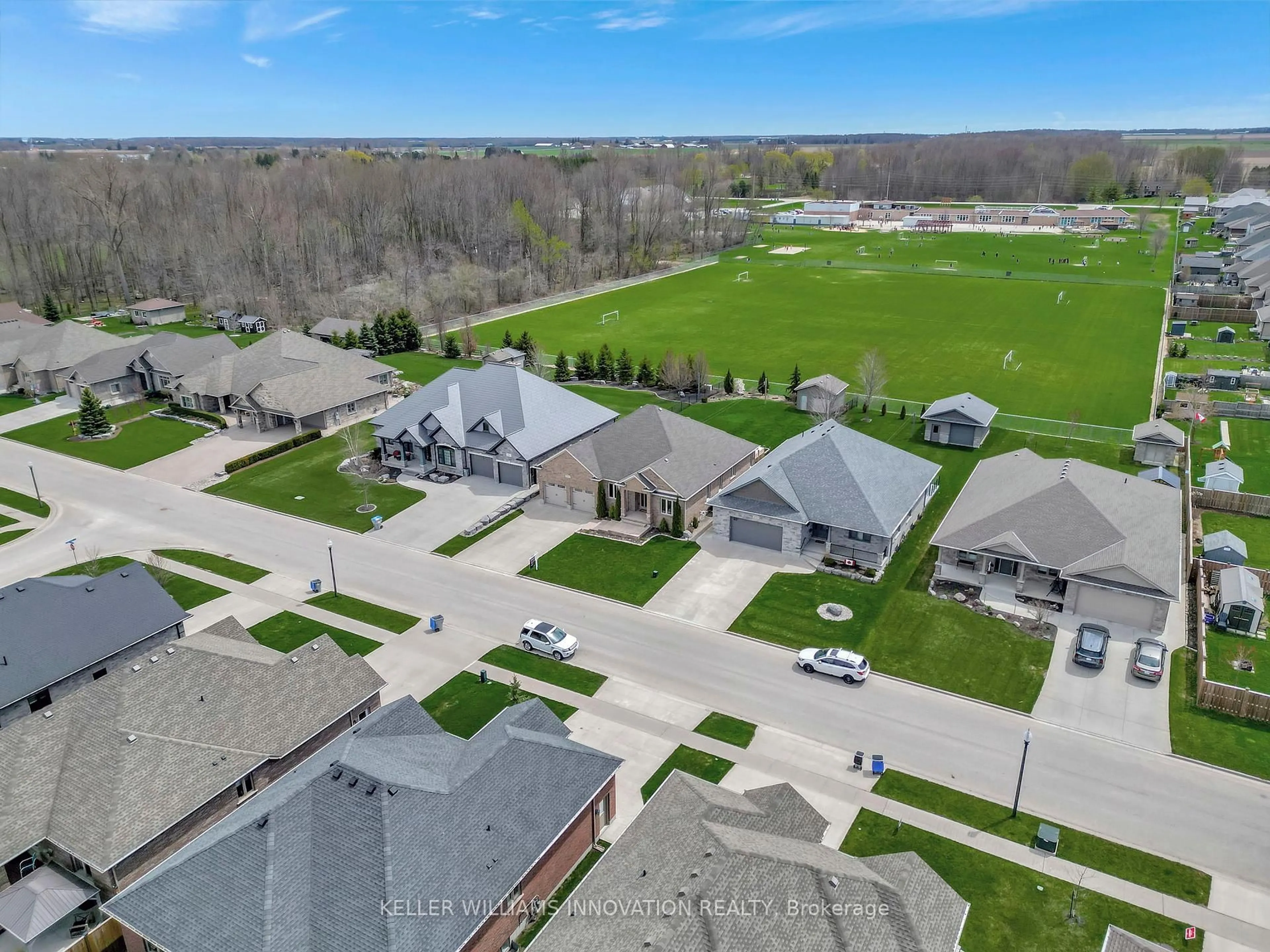 A pic from outside/outdoor area/front of a property/back of a property/a pic from drone, street for 1010 Wood Dr, North Perth Ontario N4W 0B6