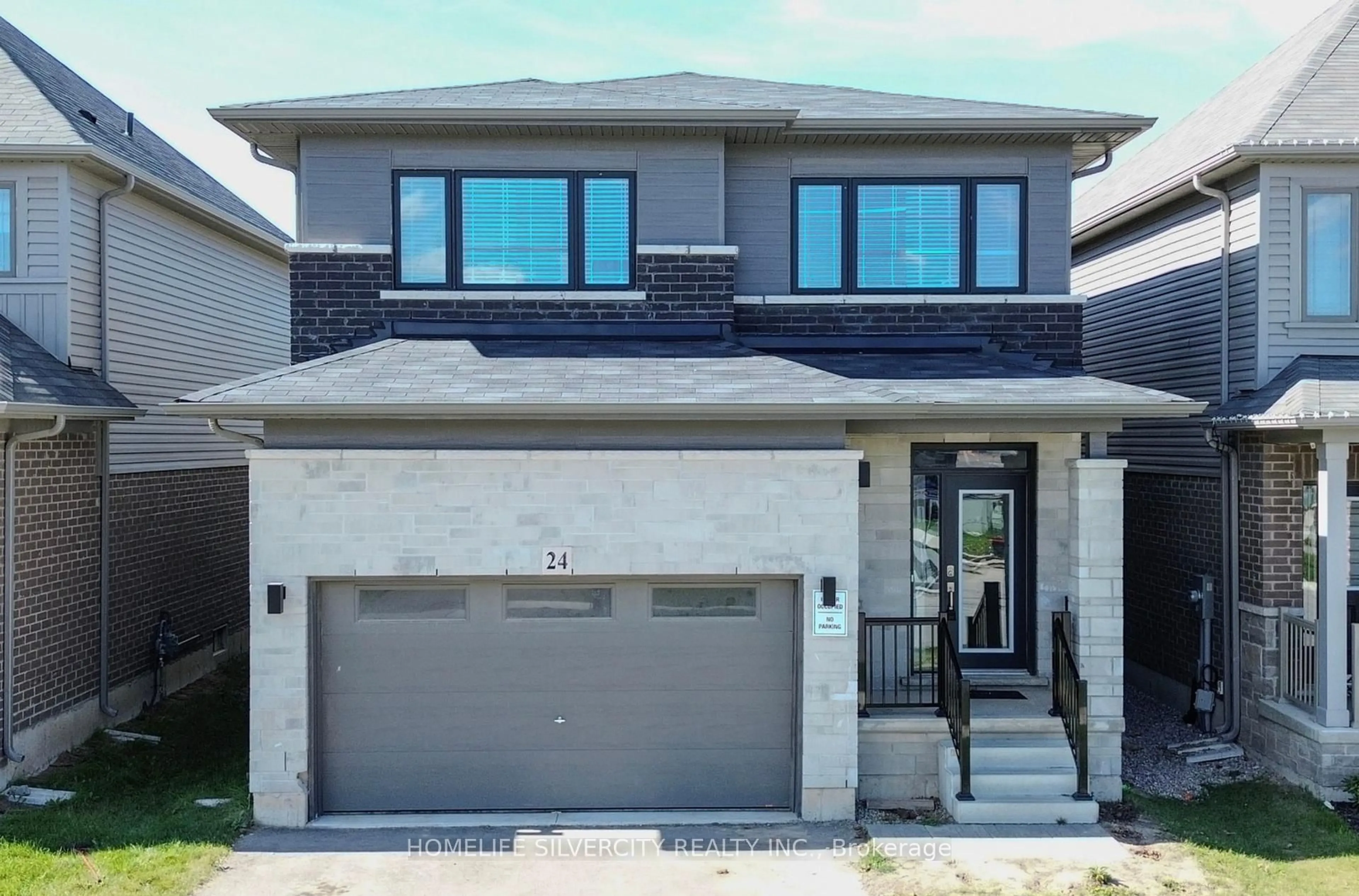 Home with brick exterior material, street for 24 Elkington Lane, Brantford Ontario N3T 0T5