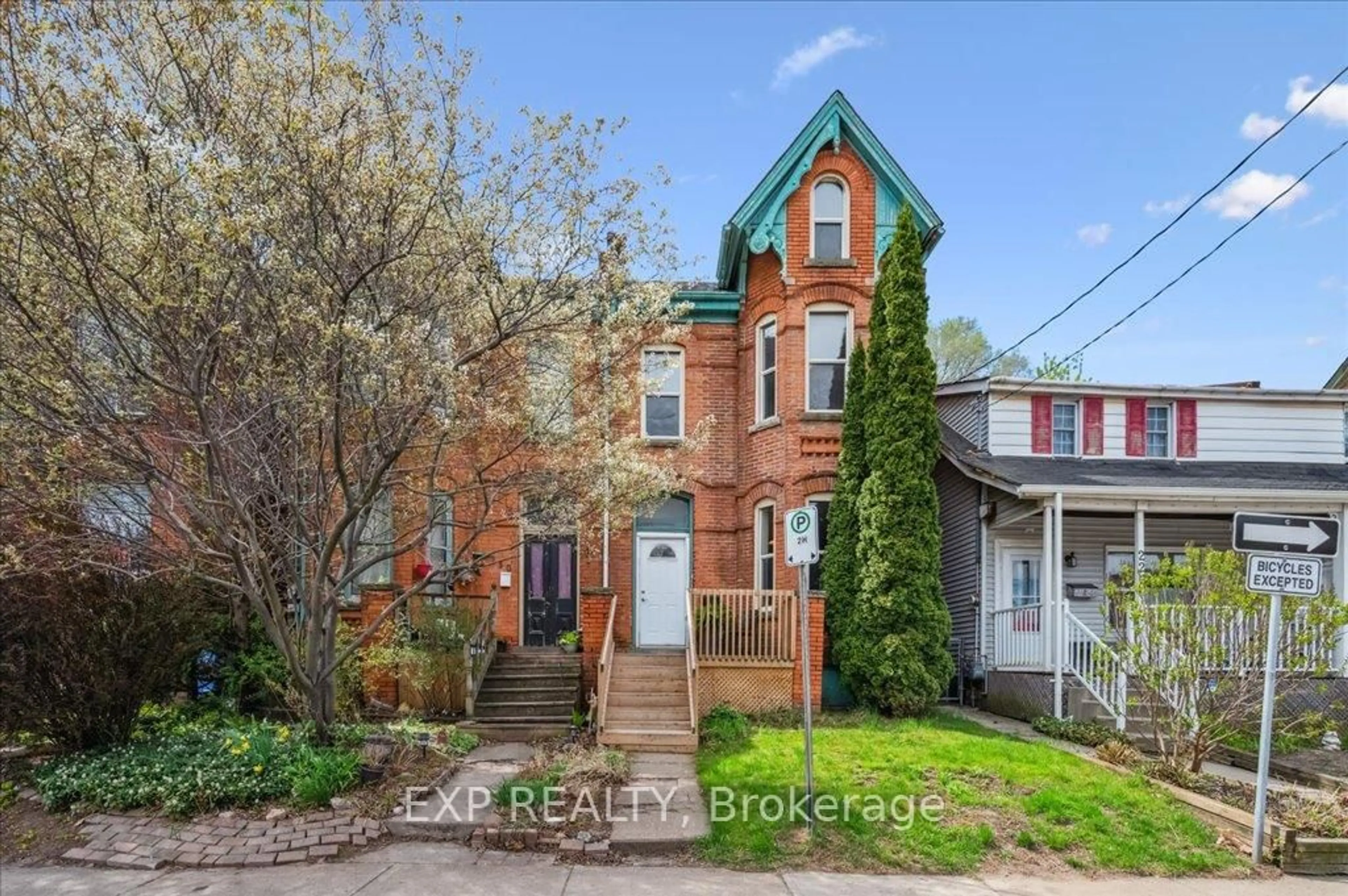 Home with brick exterior material, street for 228 Hunter St, Hamilton Ontario L8N 1N2