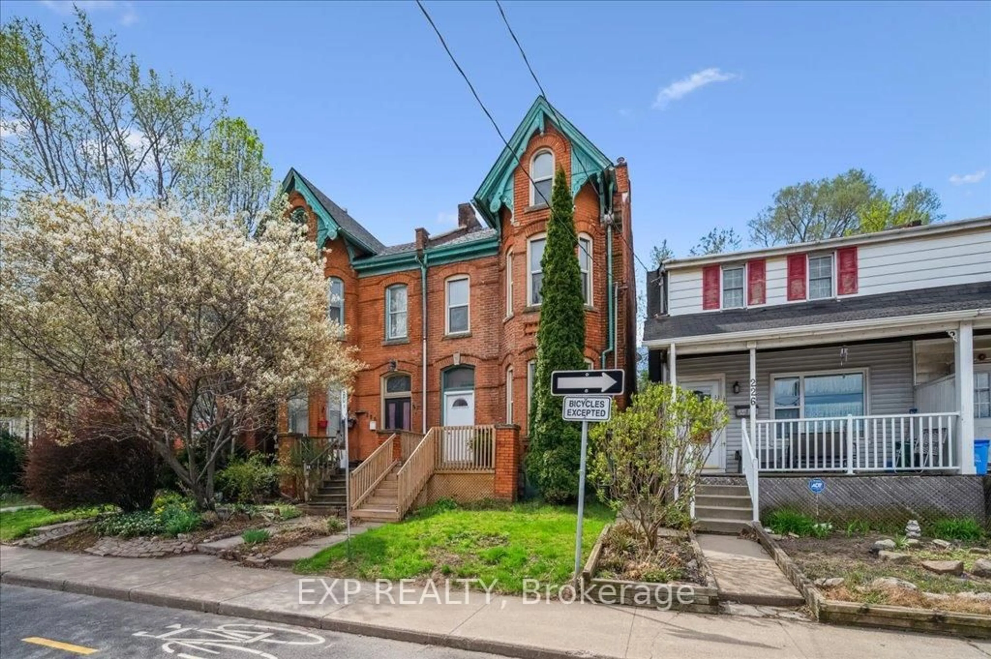 Home with brick exterior material, street for 228 Hunter St, Hamilton Ontario L8N 1N2