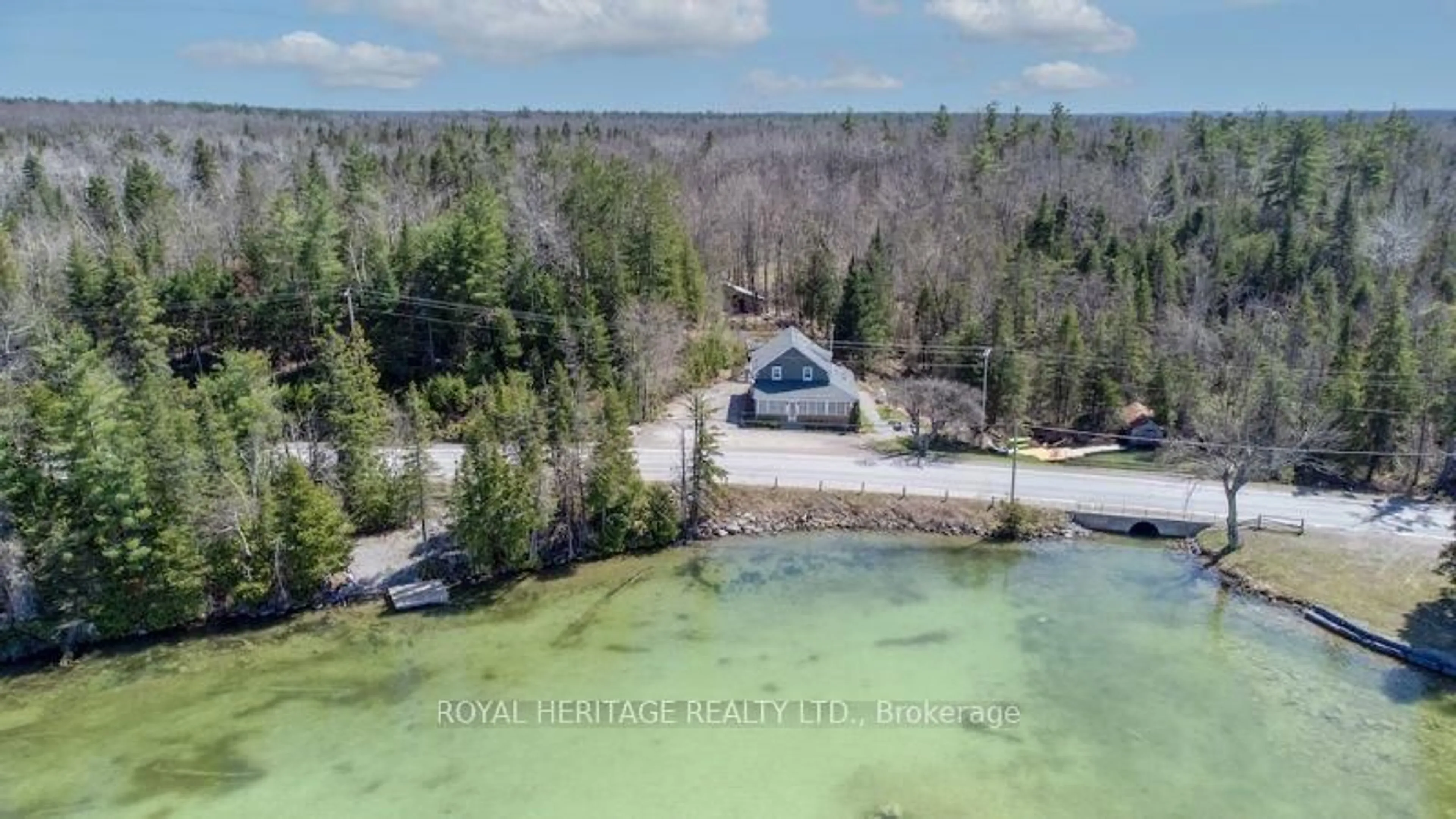 A pic from outside/outdoor area/front of a property/back of a property/a pic from drone, water/lake/river/ocean view for 1074 Lakehurst Rd, Trent Lakes Ontario K0L 2H0