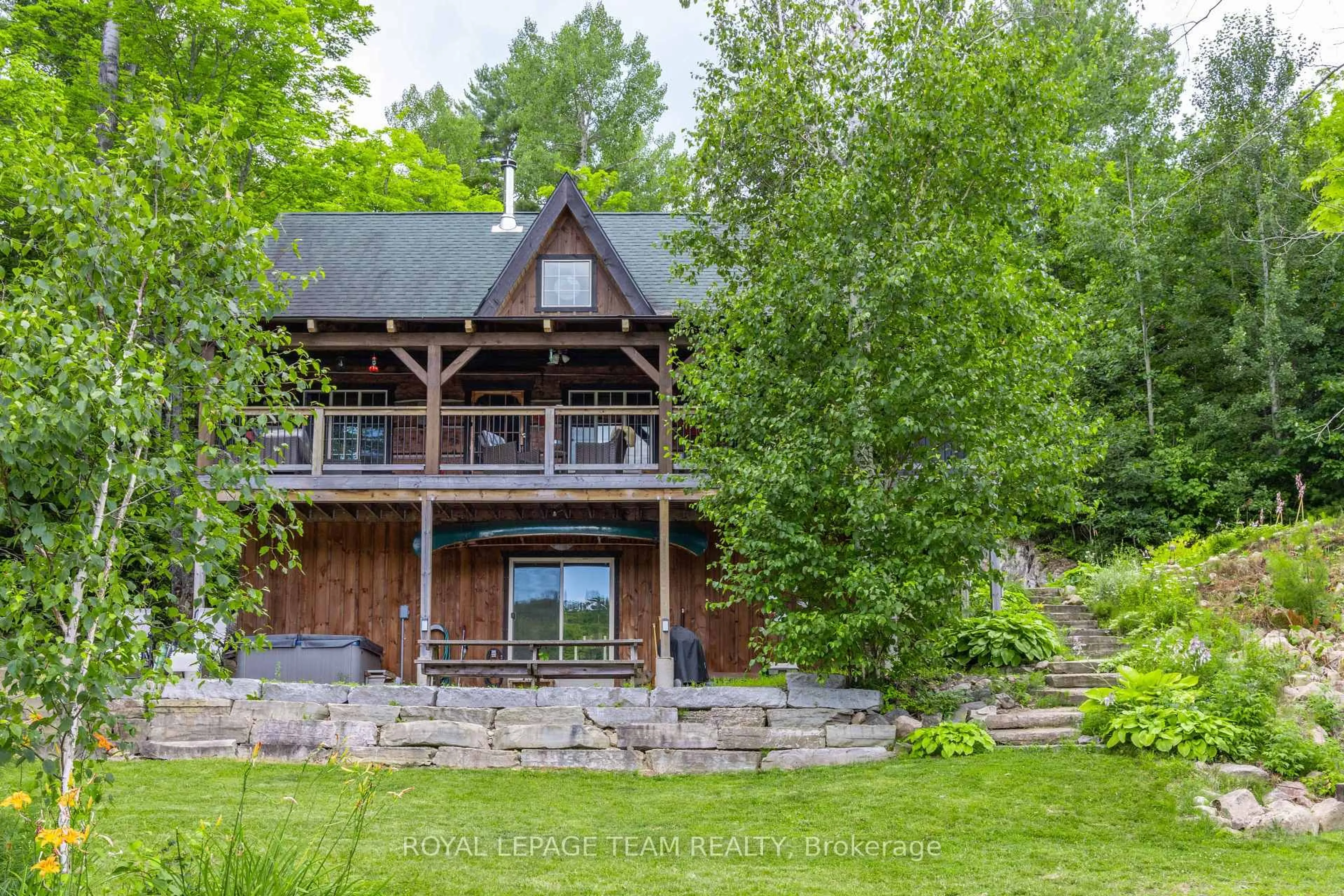 A pic from outside/outdoor area/front of a property/back of a property/a pic from drone, water/lake/river/ocean view for 16 Carson Grove Rd, Barry's Bay Ontario K0J 1B0