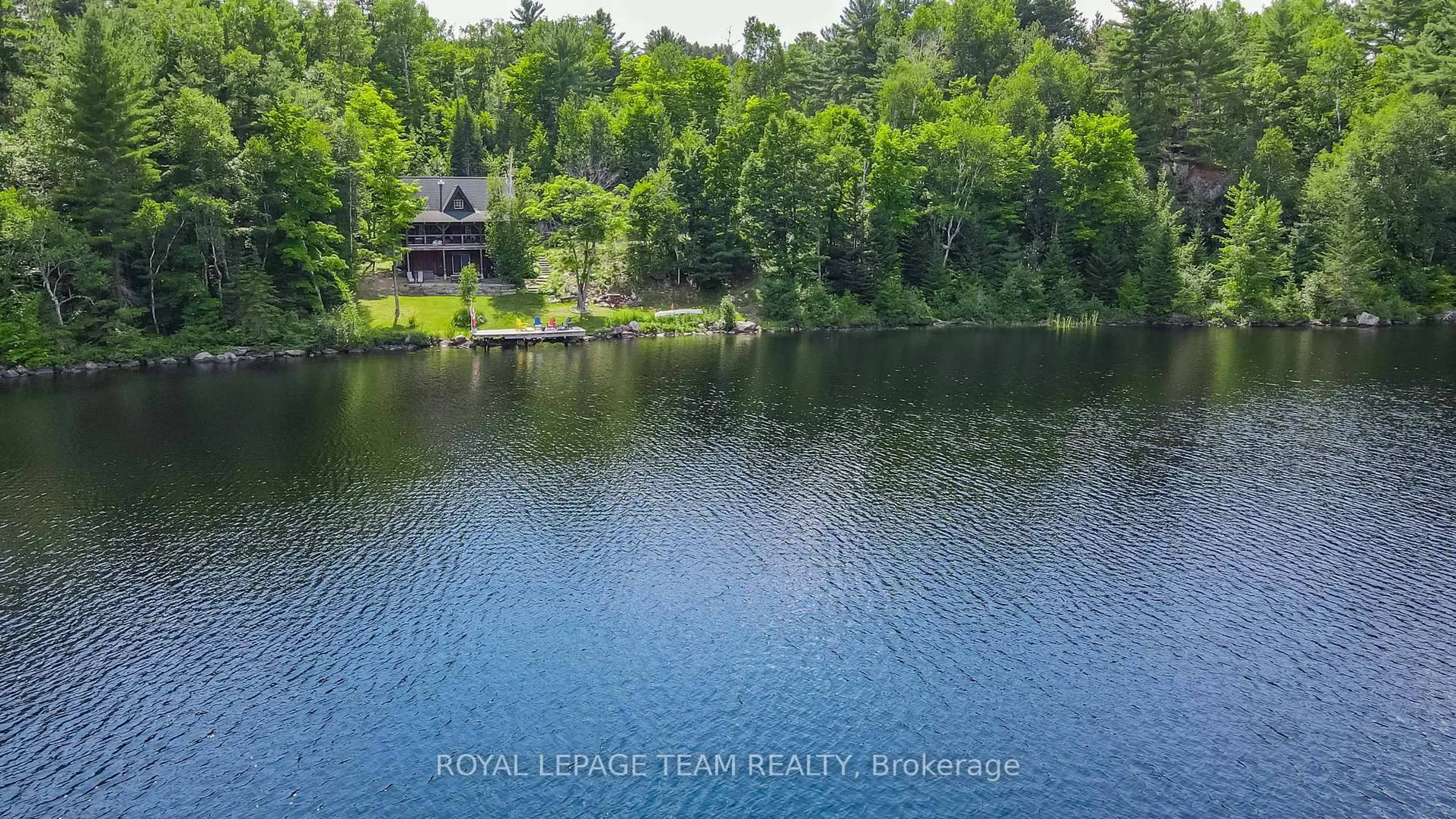 A pic from outside/outdoor area/front of a property/back of a property/a pic from drone, water/lake/river/ocean view for 16 Carson Grove Rd, Barry's Bay Ontario K0J 1B0