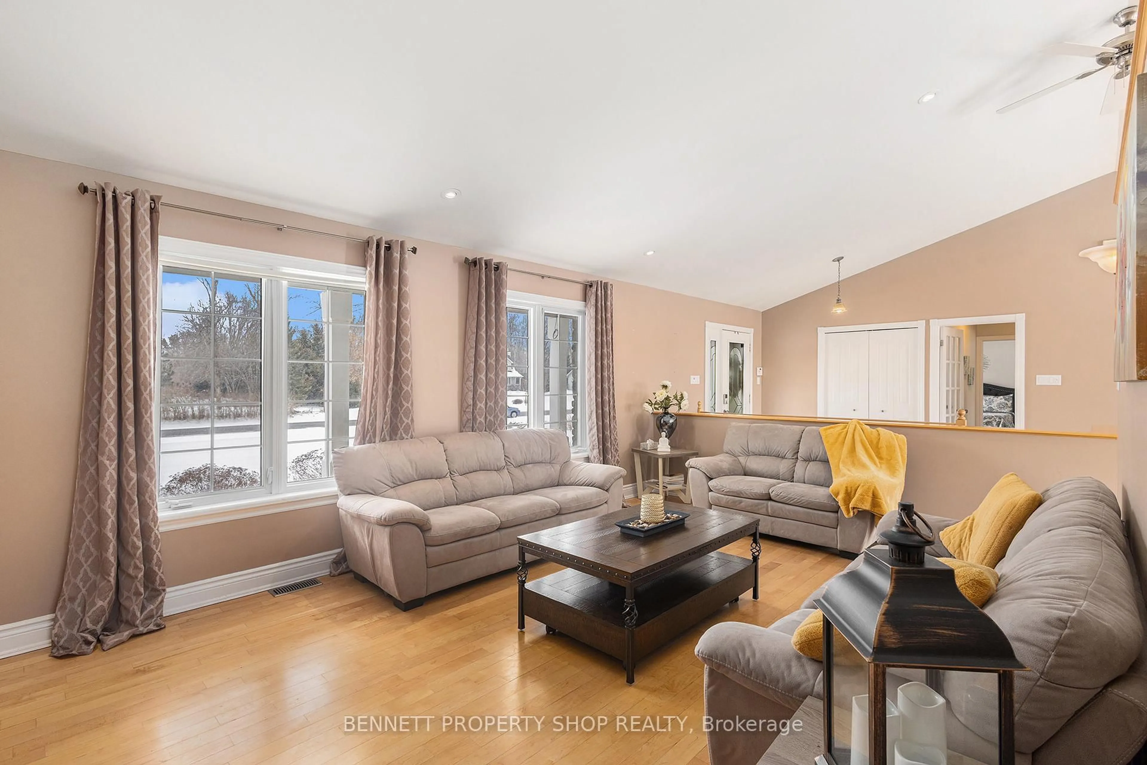 Living room with furniture, wood/laminate floor for 5705 Lombardy Dr, Osgoode Ontario K0A 2W0