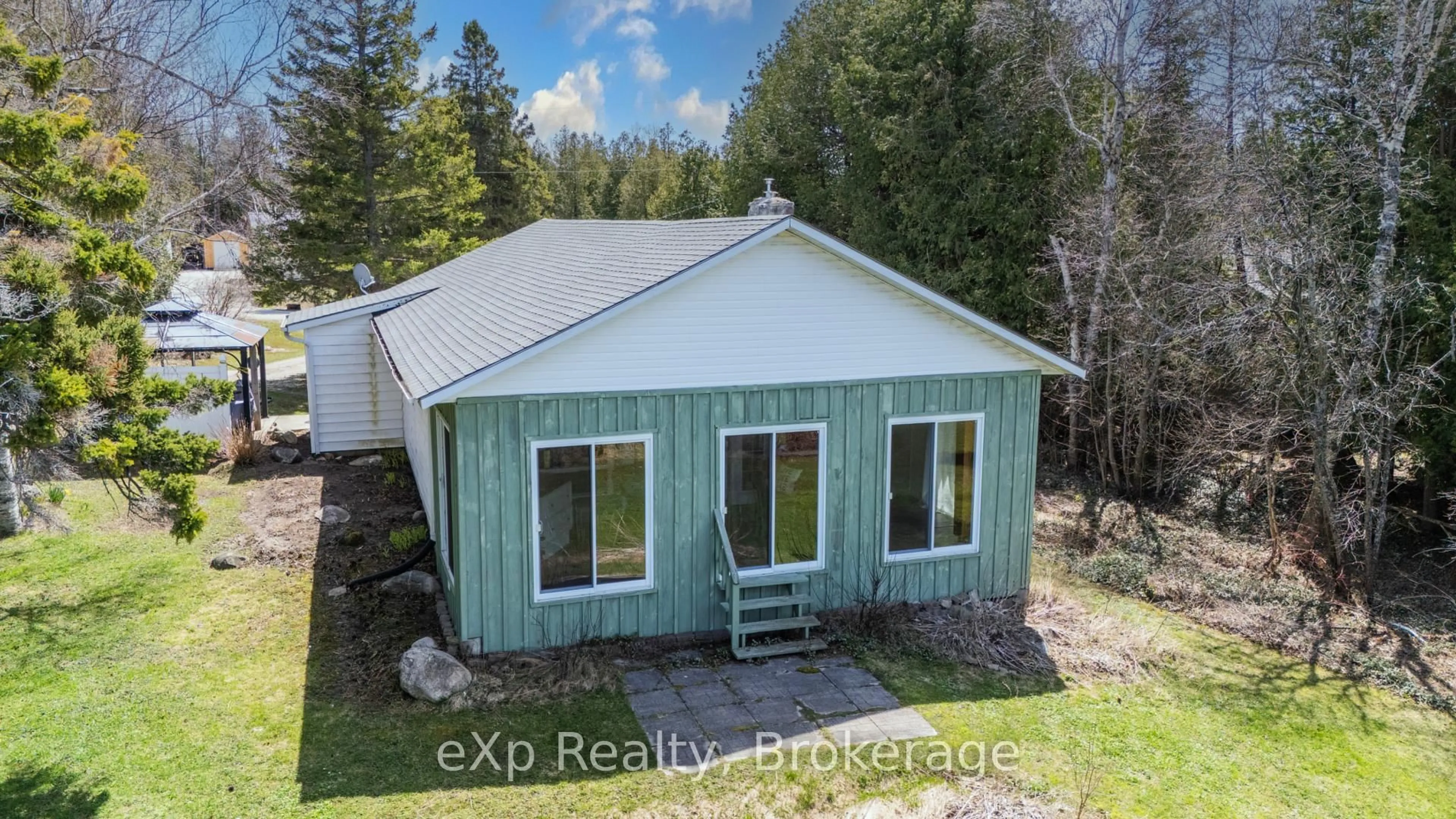 A pic from outside/outdoor area/front of a property/back of a property/a pic from drone, building for 32 Baywatch Dr, Northern Bruce Peninsula Ontario N0H 2T0