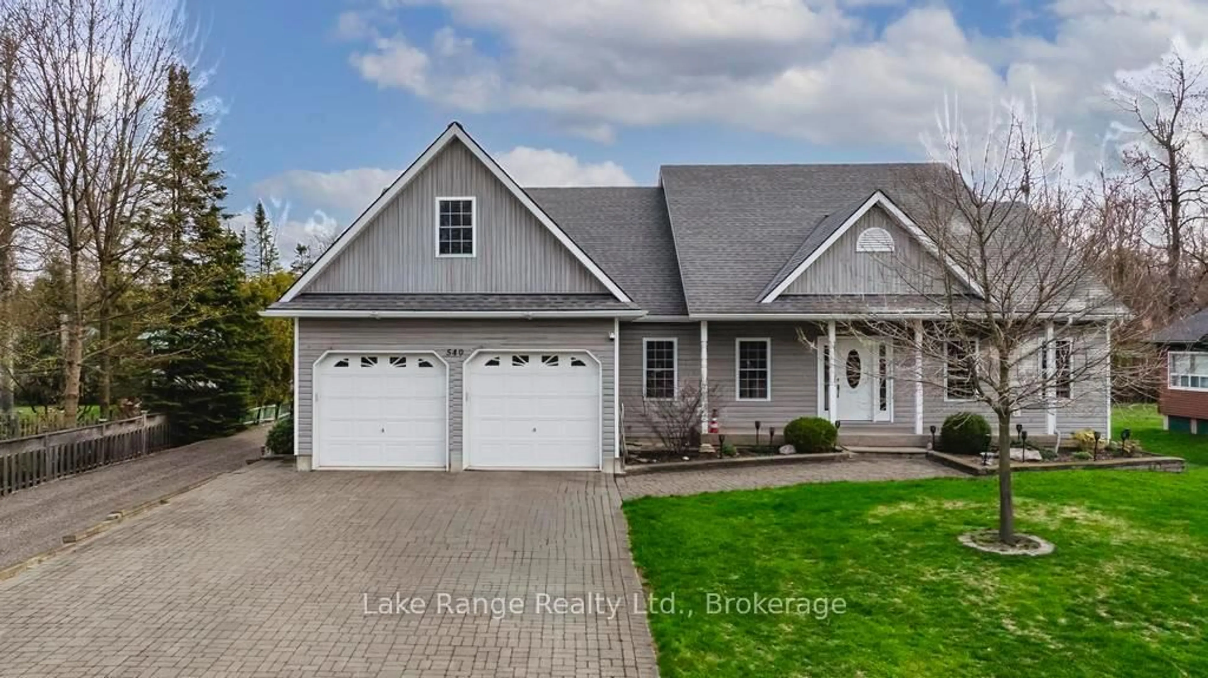 Home with vinyl exterior material, street for 540 Attawandaron Rd, Huron-Kinloss Ontario N2Z 2X3