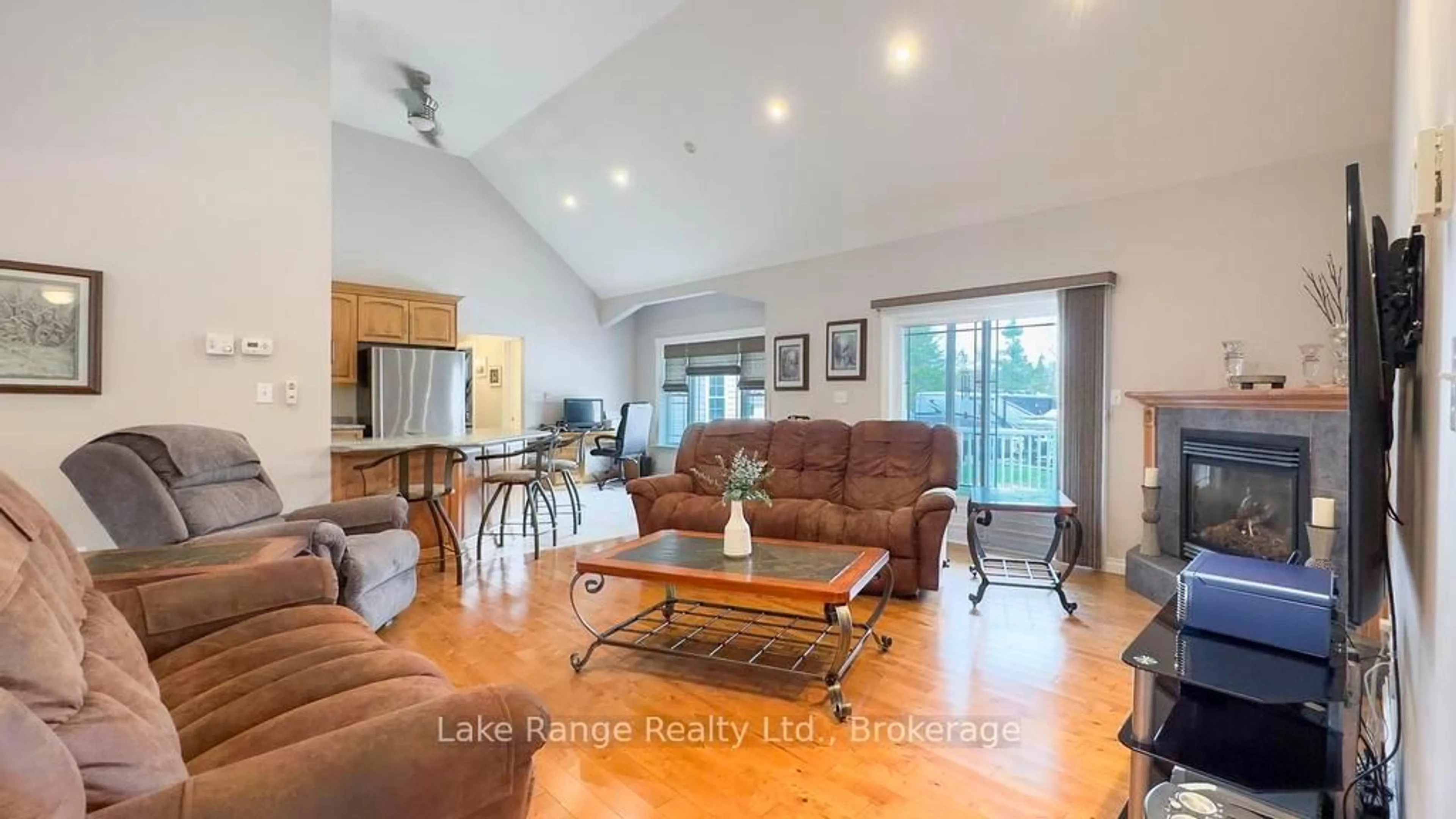 Living room with furniture, wood/laminate floor for 540 Attawandaron Rd, Huron-Kinloss Ontario N2Z 2X3