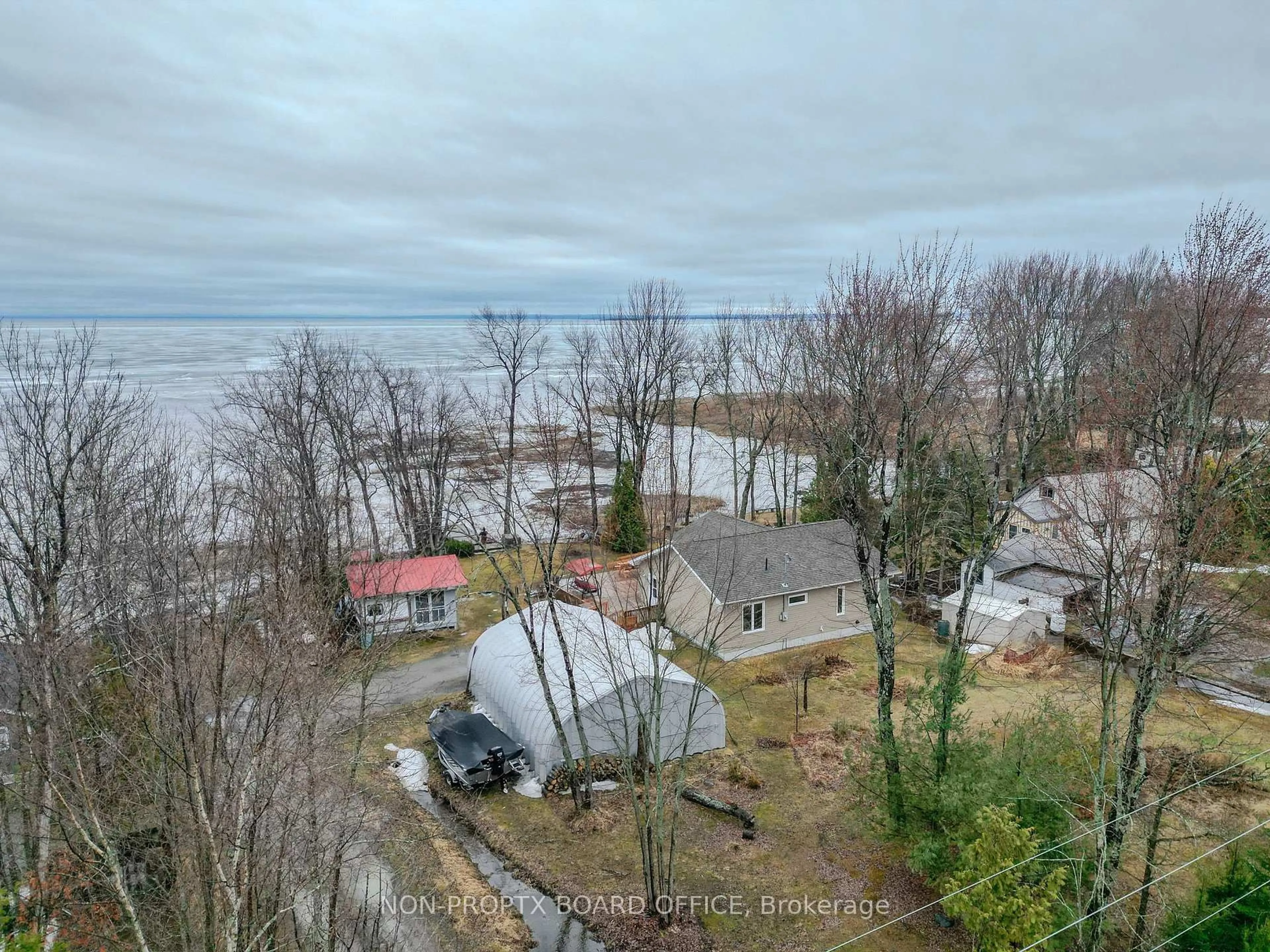A pic from outside/outdoor area/front of a property/back of a property/a pic from drone, water/lake/river/ocean view for 981 Jocko Point Rd, North Bay Ontario P1B 8G5