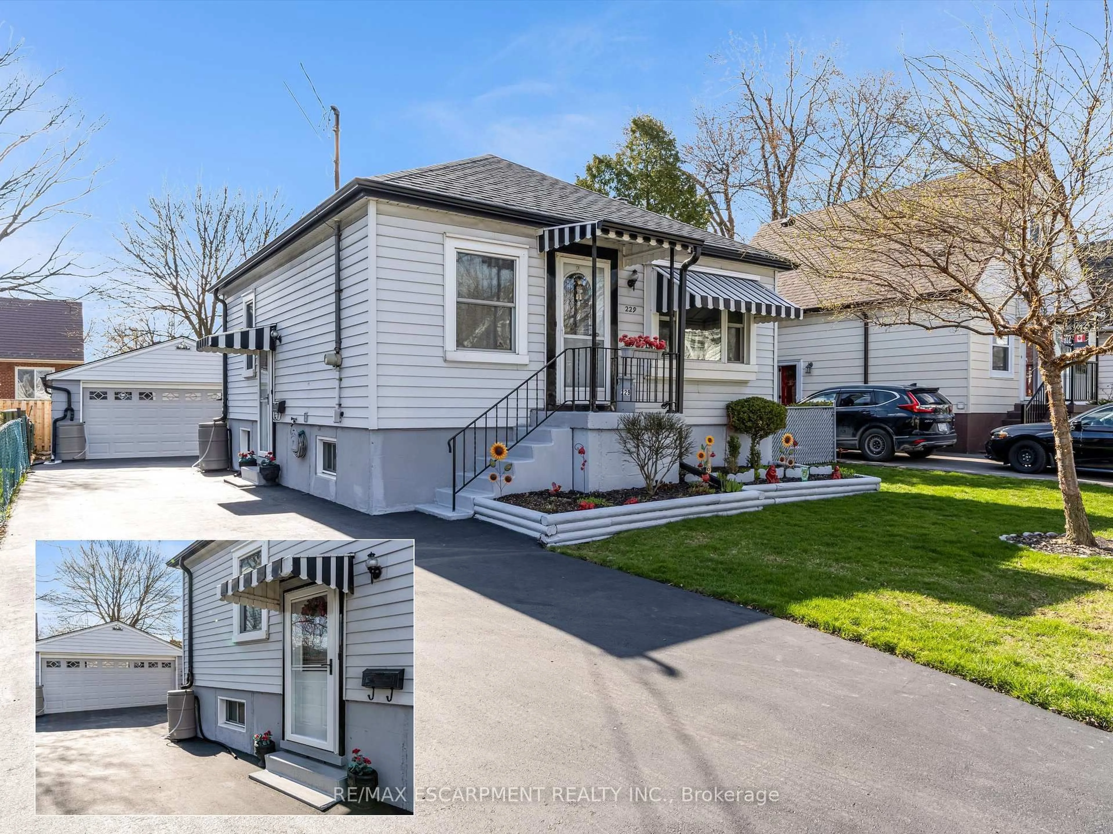 Home with vinyl exterior material, street for 229 East 31st St, Hamilton Ontario L8V 3P6
