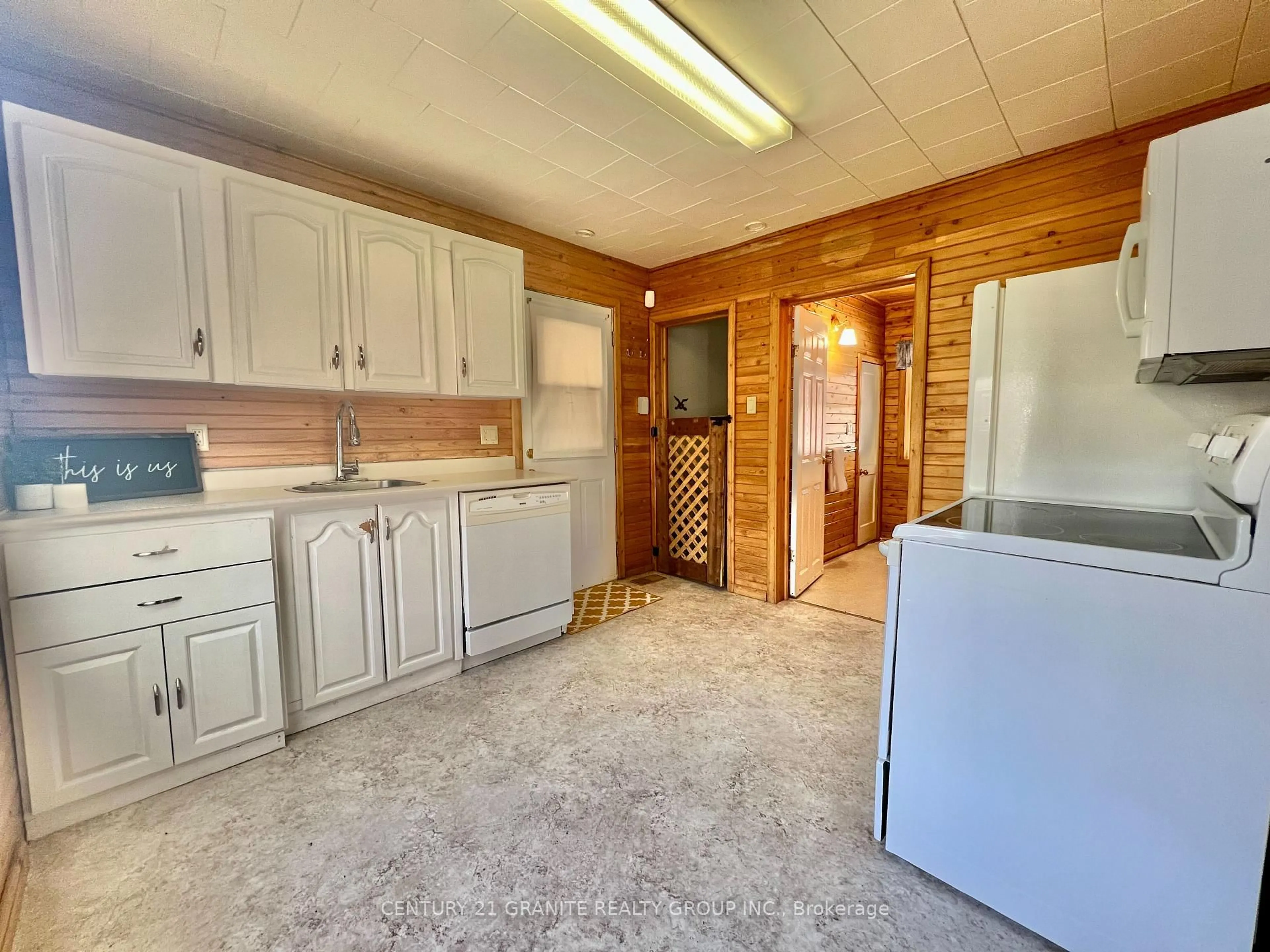 Kitchen with laundary machines, unknown for 61 Bridge St, Bancroft Ontario K0L 1C0