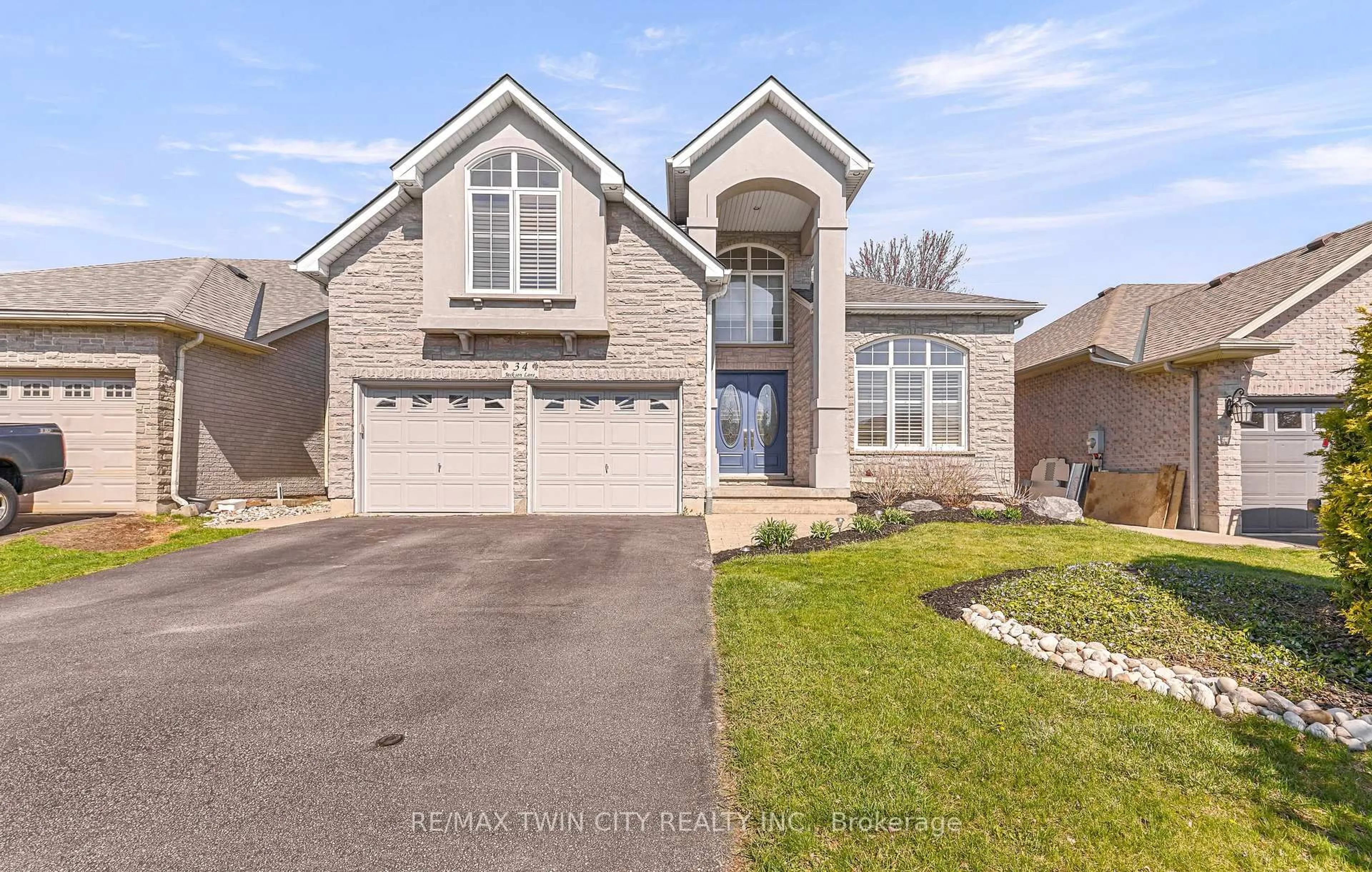 Home with brick exterior material, street for 34 Jackson Lane, Brantford Ontario N3R 7Z7