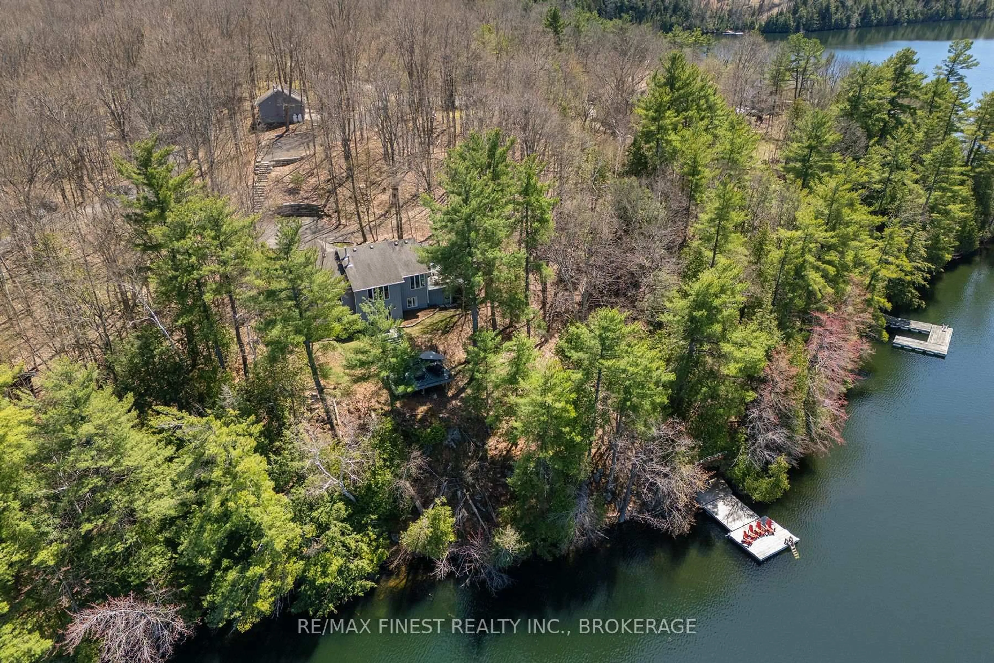A pic from outside/outdoor area/front of a property/back of a property/a pic from drone, water/lake/river/ocean view for 1150 Deer Park Lane, Hartington Ontario K0H 1W0
