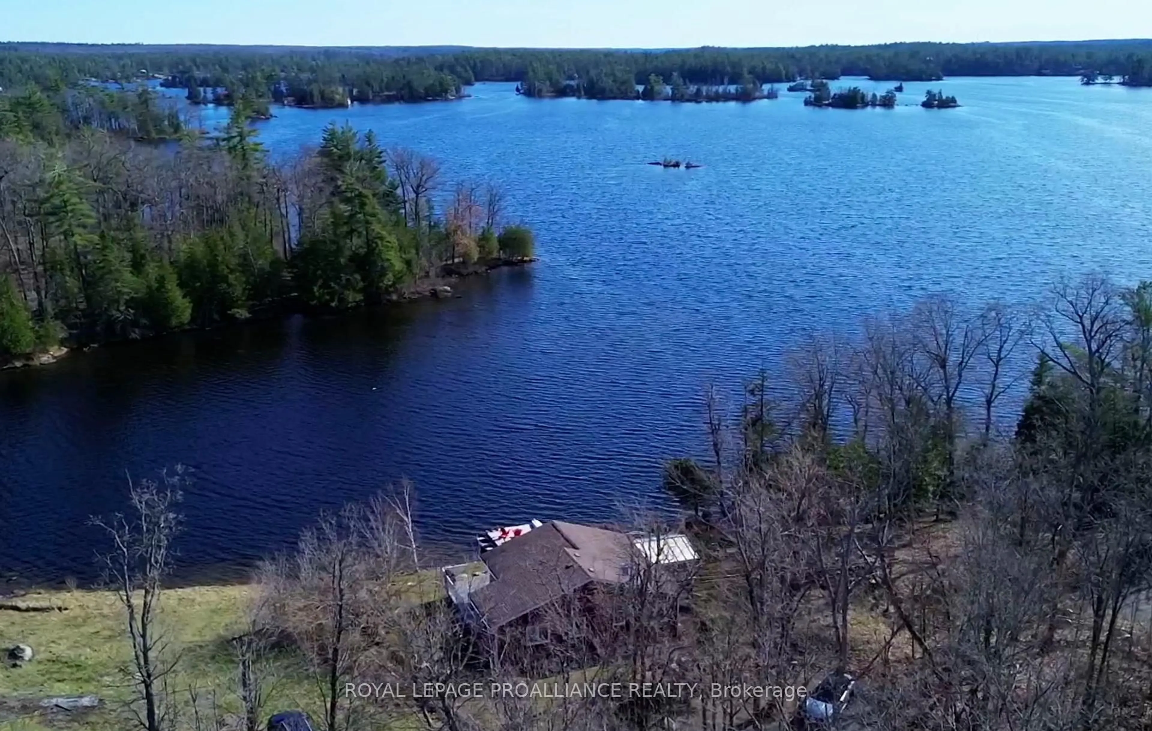 A pic from outside/outdoor area/front of a property/back of a property/a pic from drone, water/lake/river/ocean view for 319 Fire Route 4 N/A, North Kawartha Ontario K0L 2H0