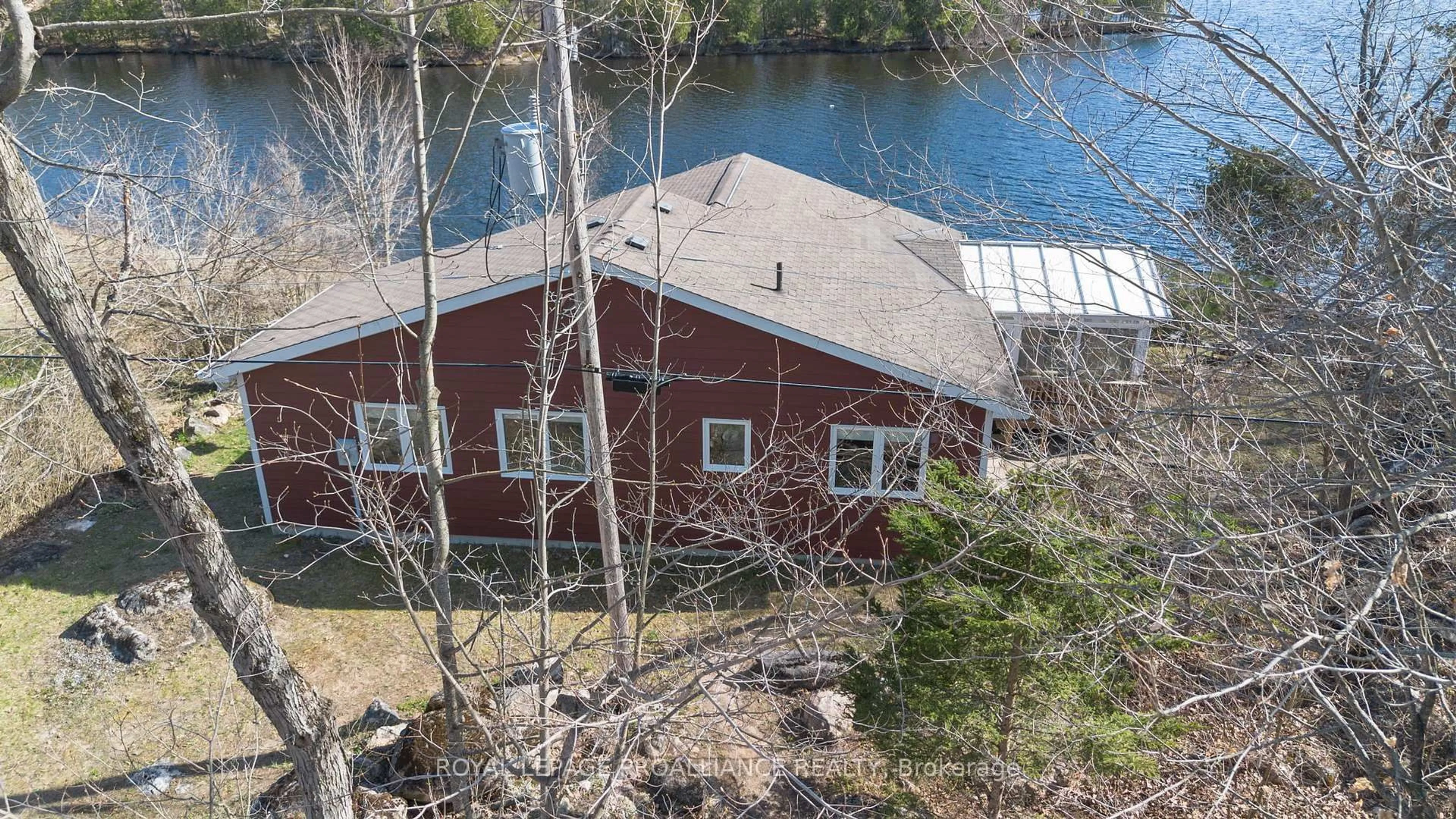 A pic from outside/outdoor area/front of a property/back of a property/a pic from drone, water/lake/river/ocean view for 319 Fire Route 4 N/A, North Kawartha Ontario K0L 2H0