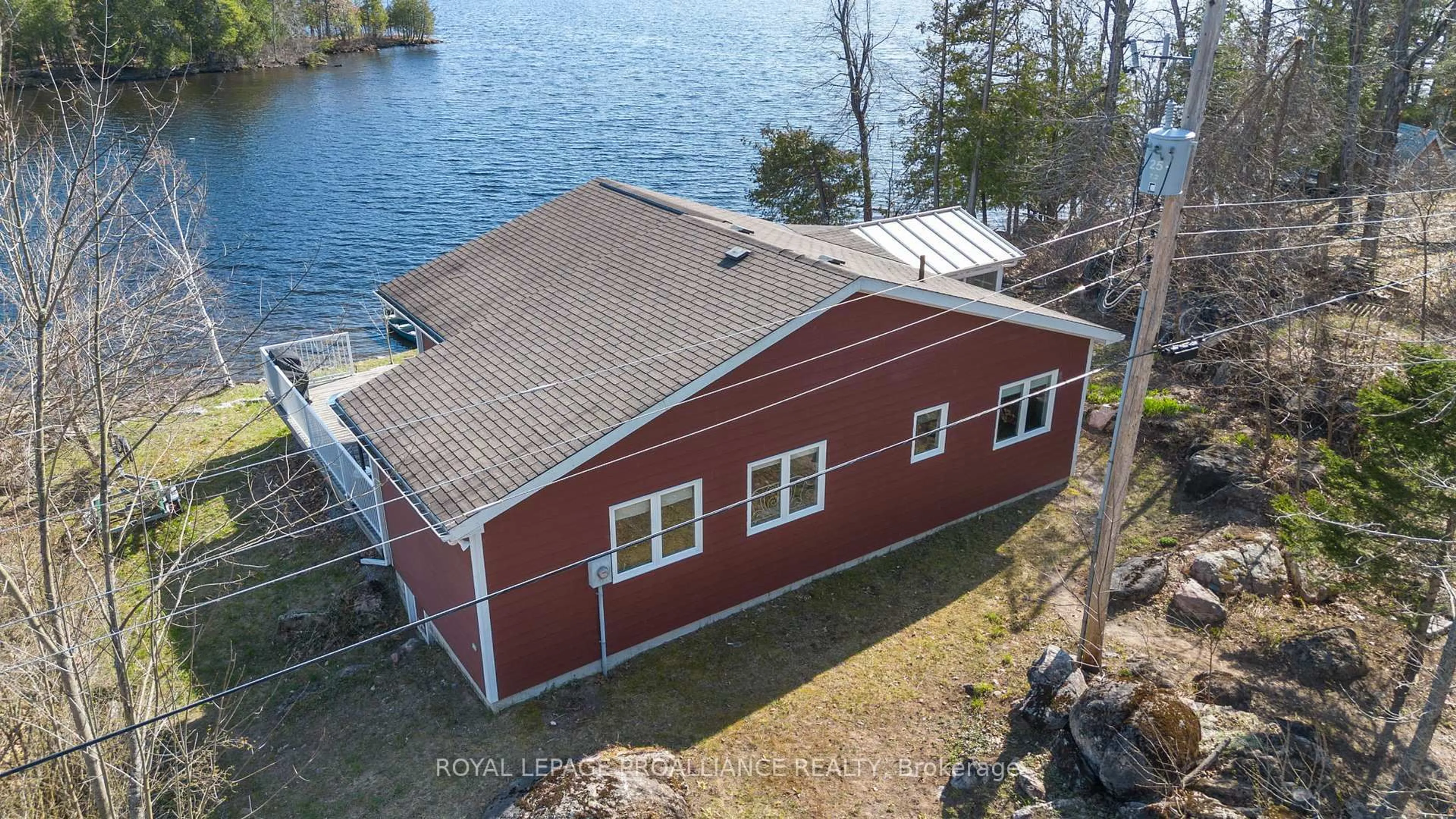 A pic from outside/outdoor area/front of a property/back of a property/a pic from drone, water/lake/river/ocean view for 319 Fire Route 4 N/A, North Kawartha Ontario K0L 2H0