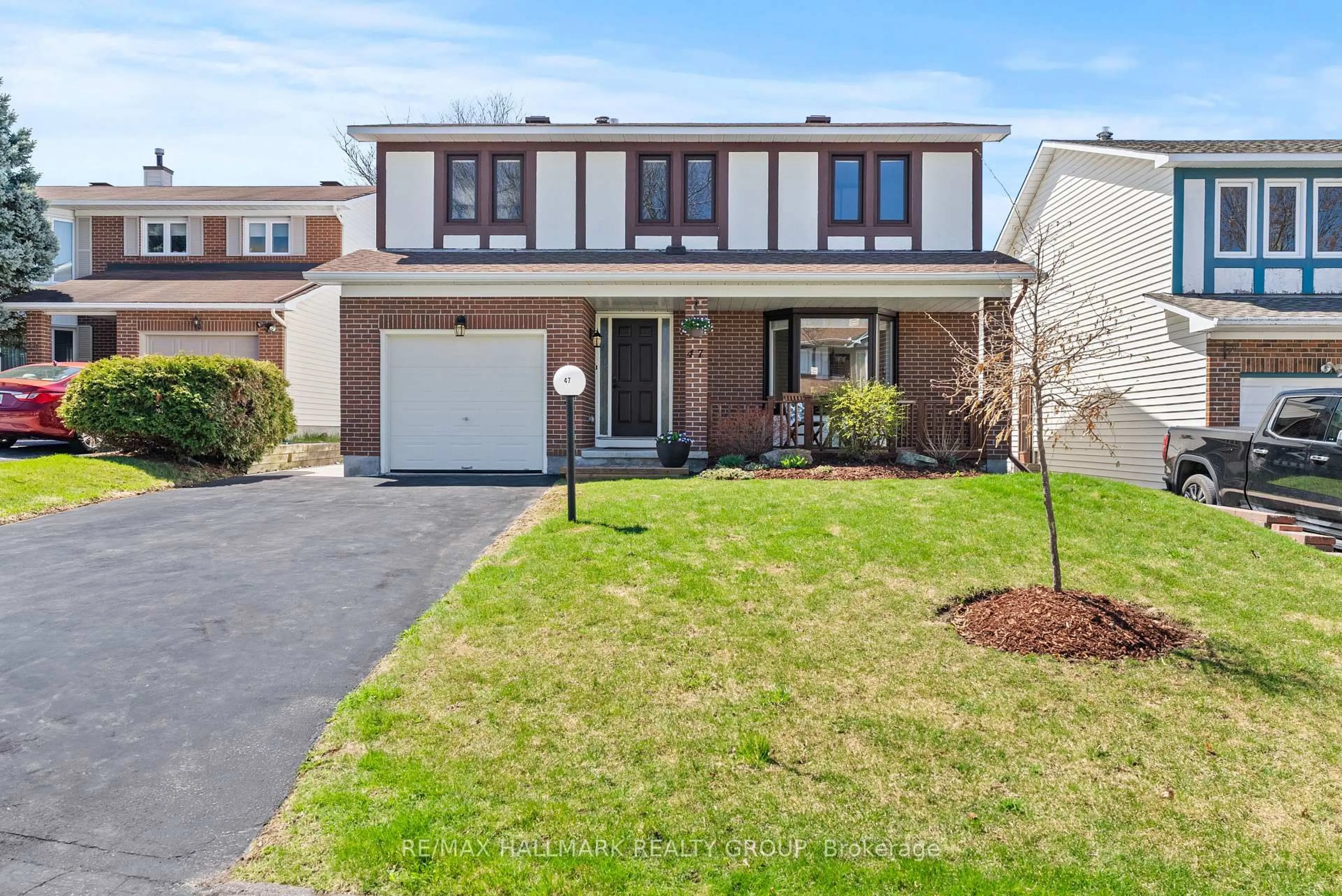 Home with brick exterior material, street for 47 Parsons Ridge Rd, Ottawa Ontario K2L 2X5