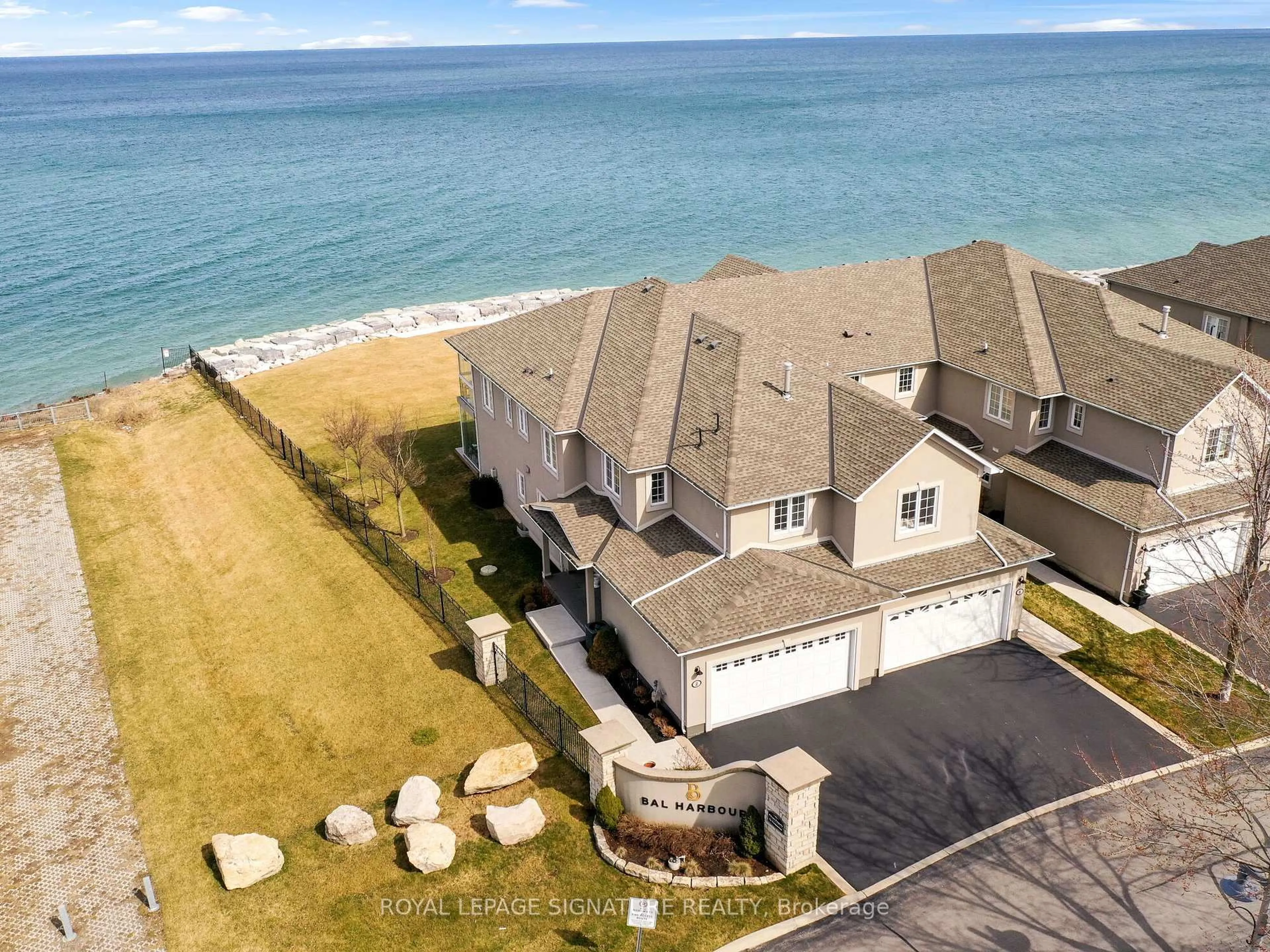 A pic from outside/outdoor area/front of a property/back of a property/a pic from drone, water/lake/river/ocean view for 484 Millen Rd #2, Hamilton Ontario L8E 6G4