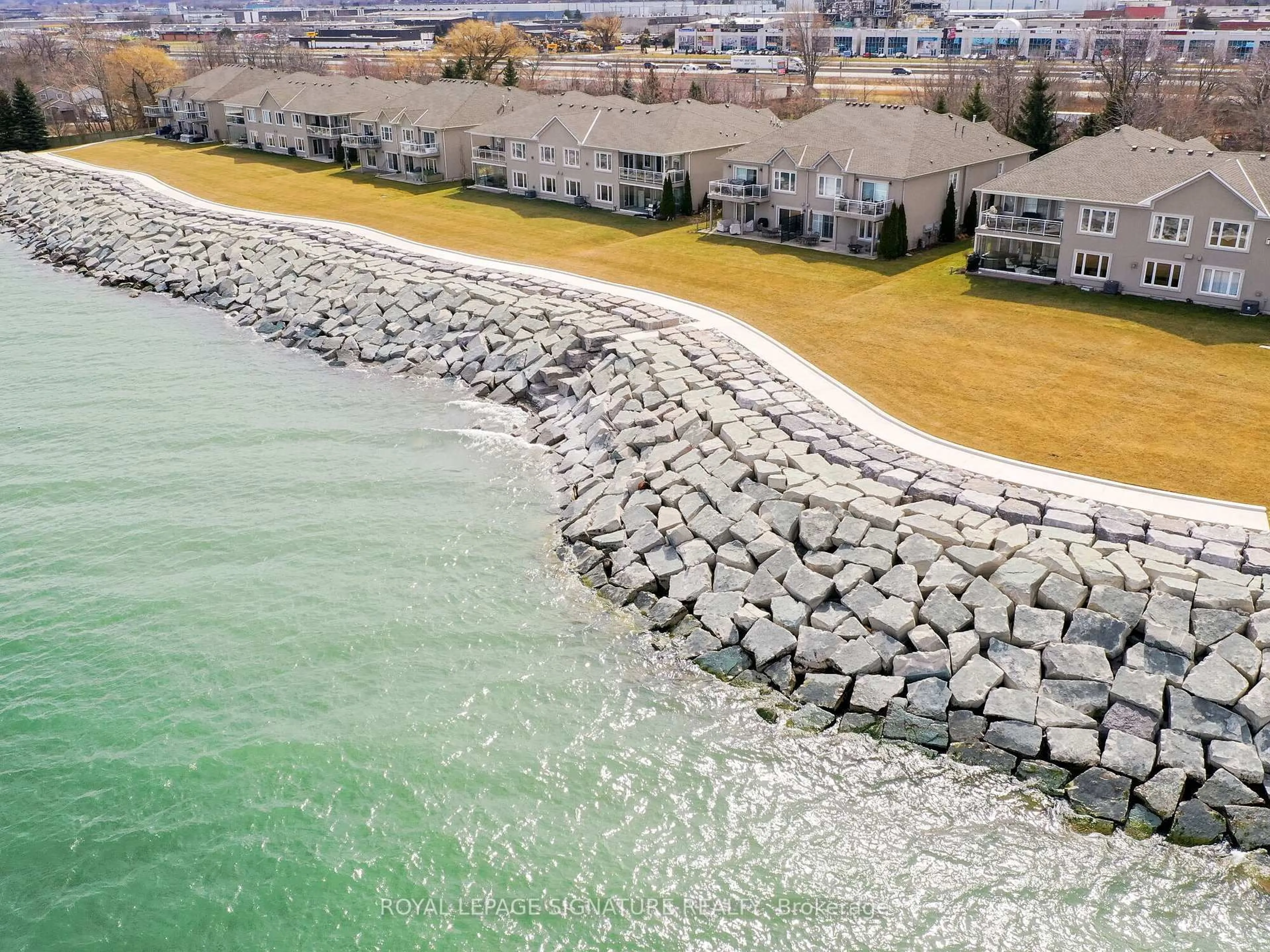 A pic from outside/outdoor area/front of a property/back of a property/a pic from drone, water/lake/river/ocean view for 484 Millen Rd #2, Hamilton Ontario L8E 6G4
