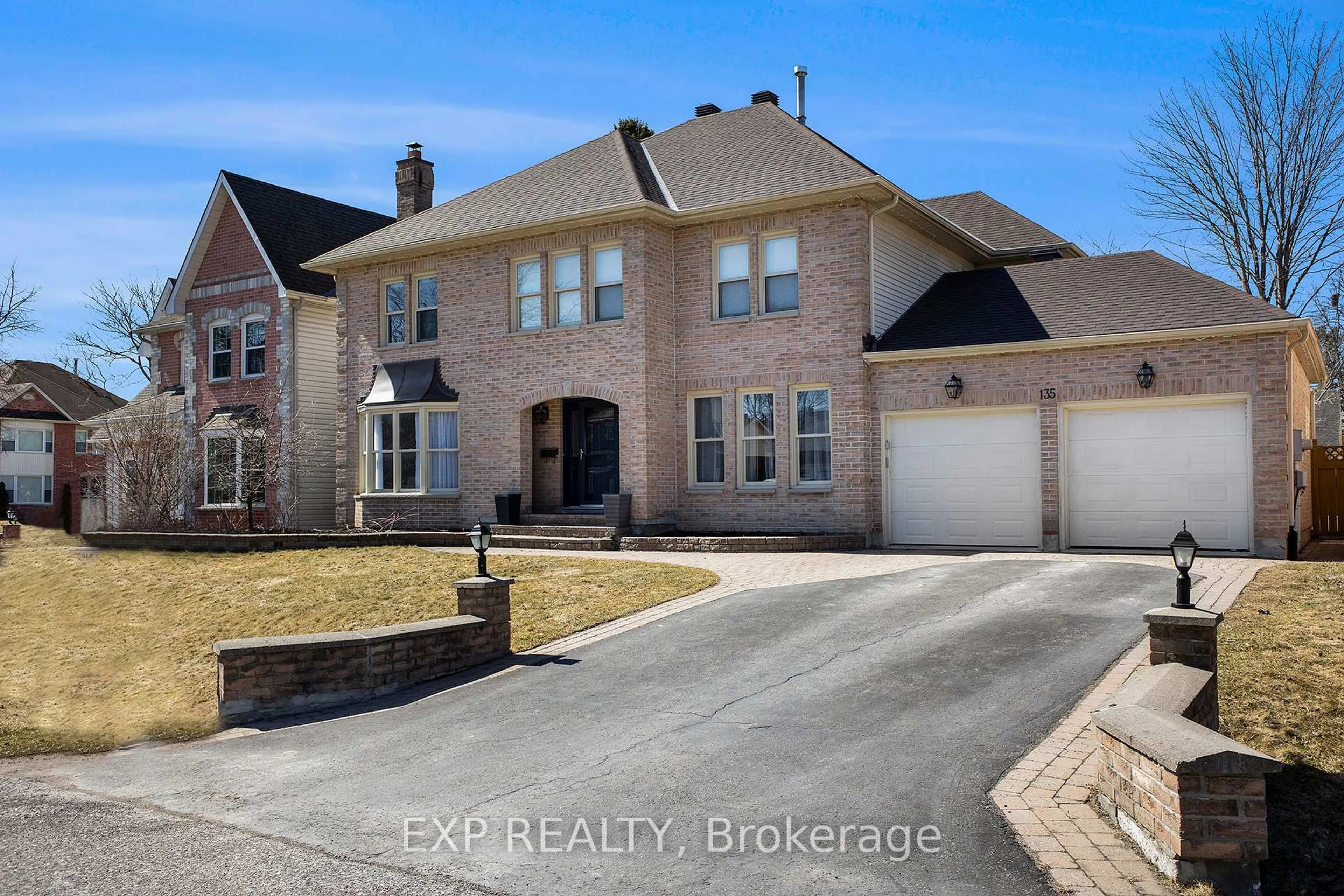 Home with brick exterior material, street for 135 Lanigan Cres, Stittsville Ontario K2S 1G9