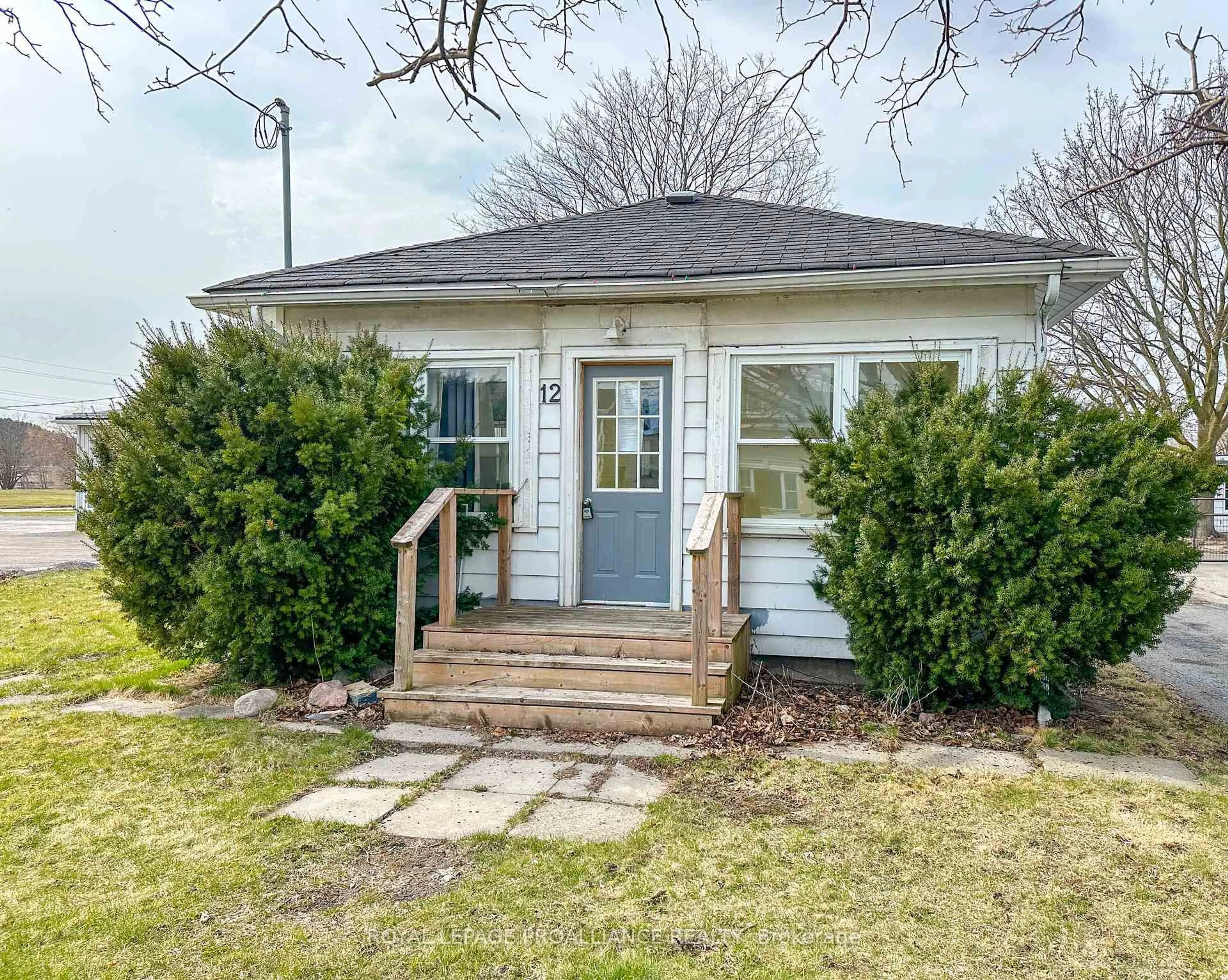 Home with vinyl exterior material, street for 12 College St, Quinte West Ontario K8V 1P7