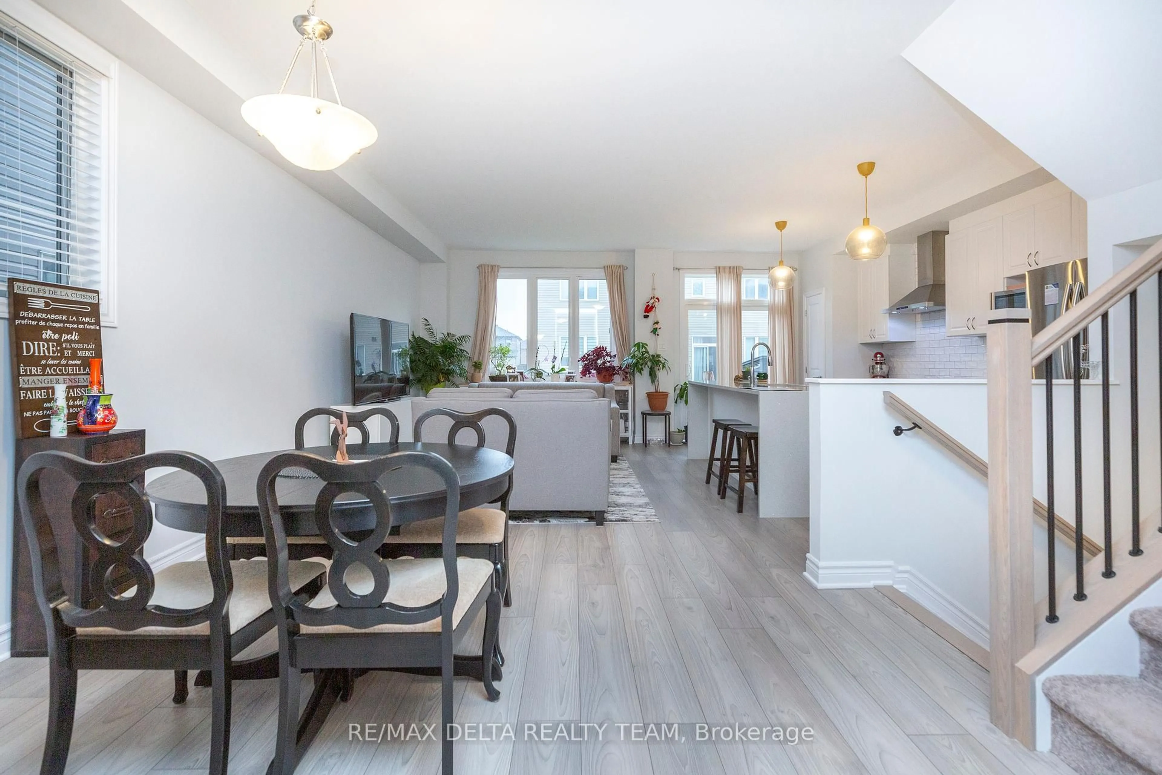 Open concept kitchen, wood/laminate floor for 310 Guppy Grve, Orleans Ontario K4A 5G8