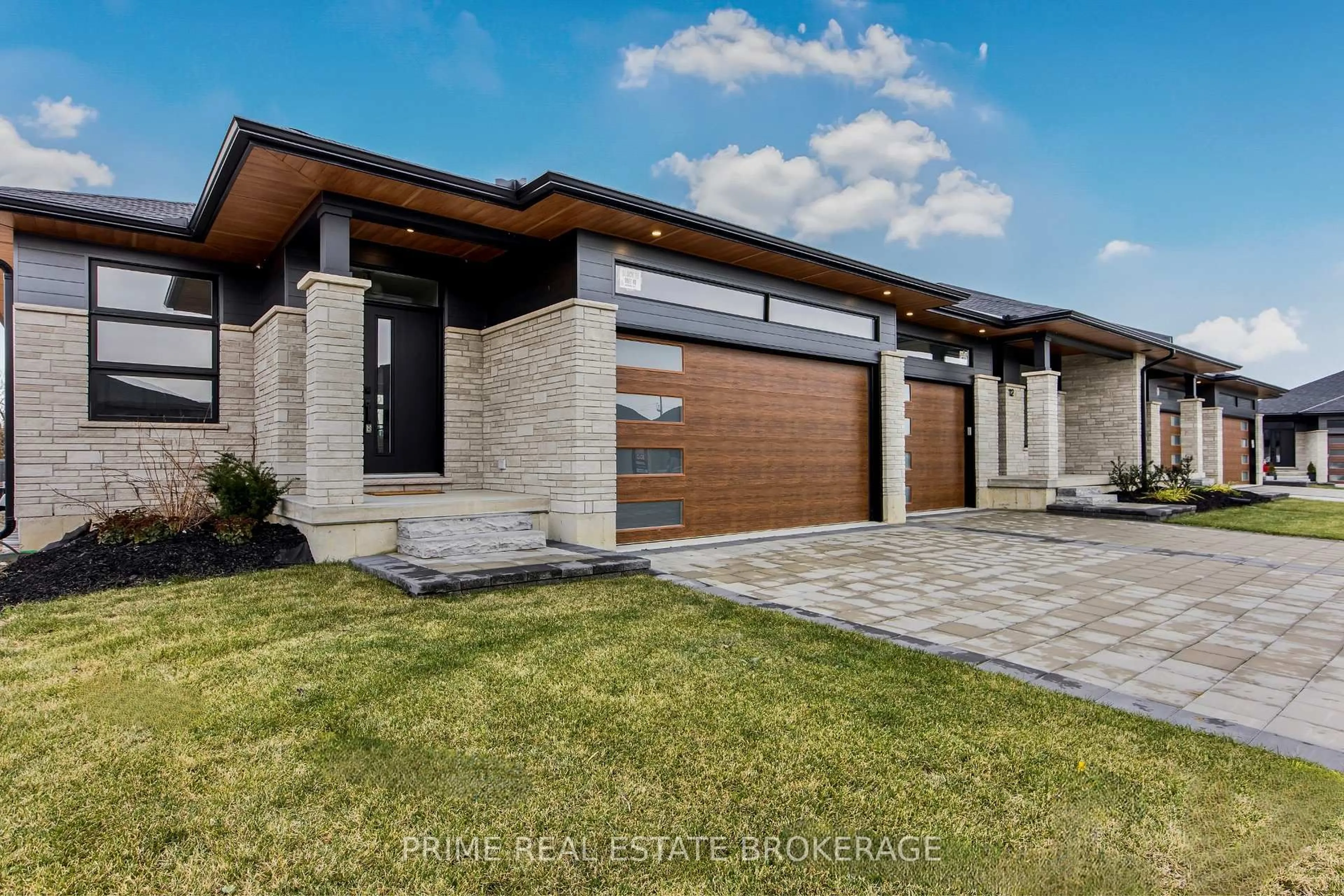Home with brick exterior material, street for 14 COASTAL Cres #49, Lambton Shores Ontario N0M 1T0