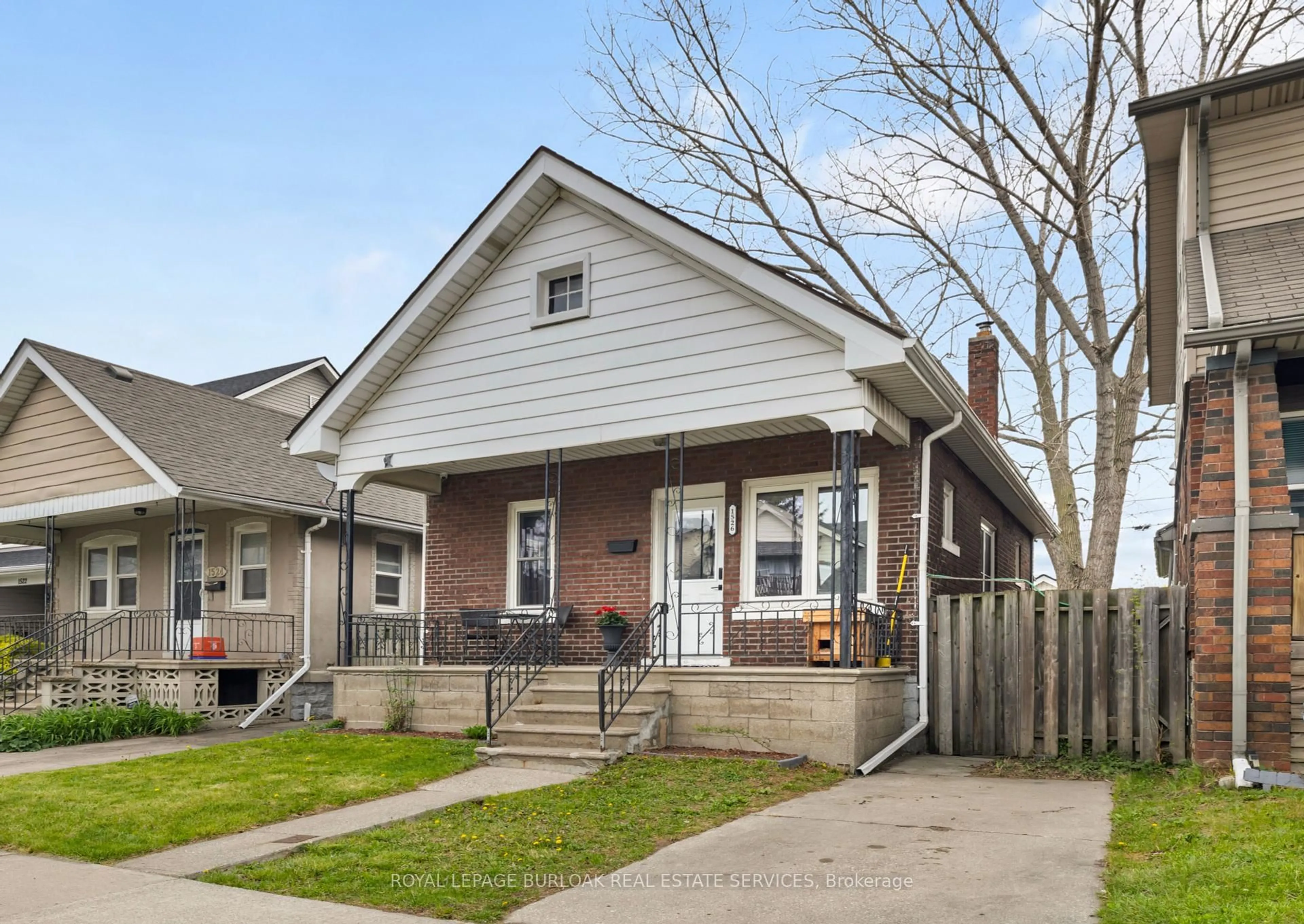 Home with brick exterior material, street for 1526 Lillian Ave, Windsor Ontario N8X 4A8