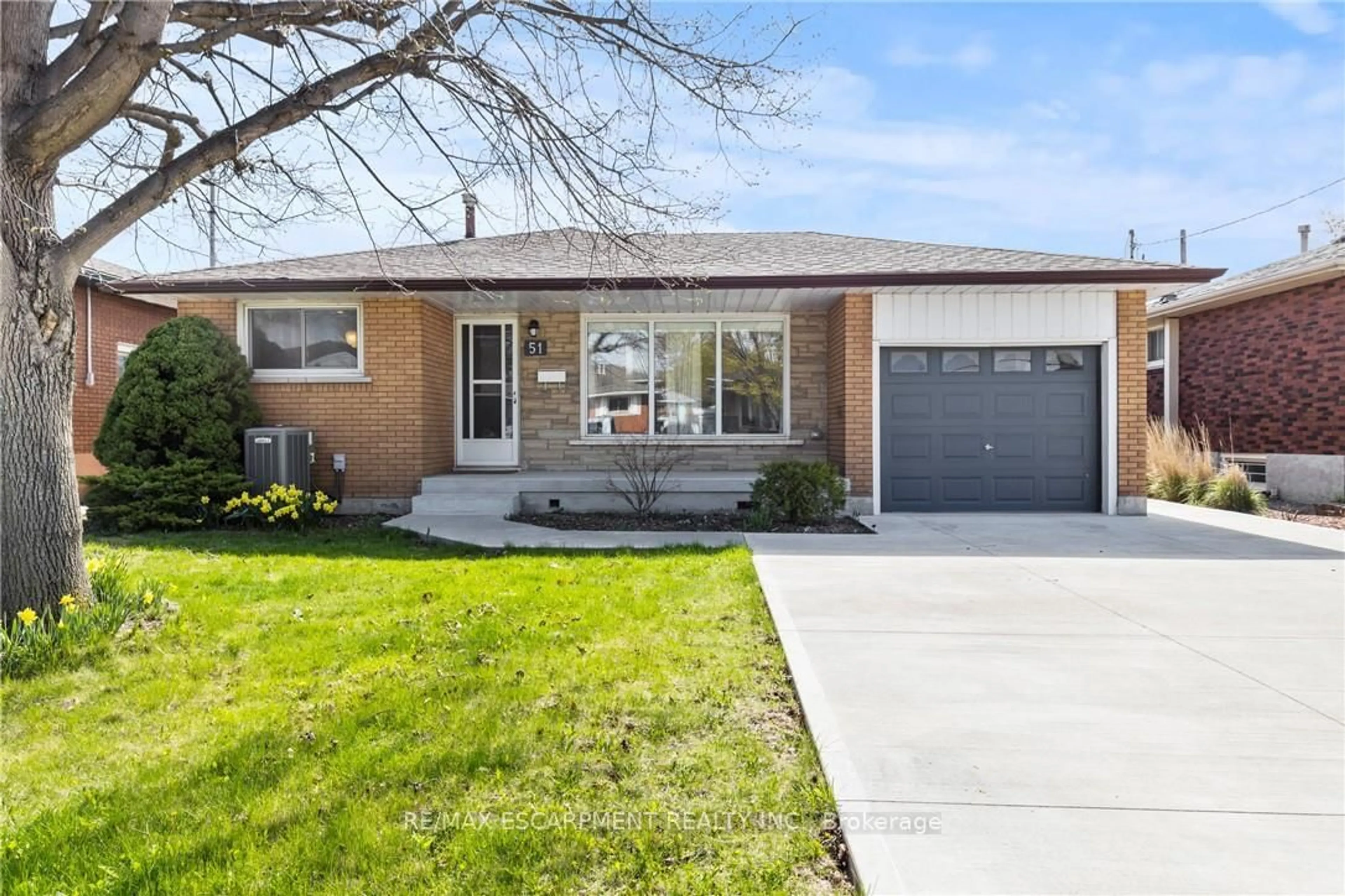 Home with brick exterior material, street for 51 Moxley Dr, Hamilton Ontario L8T 3Y6
