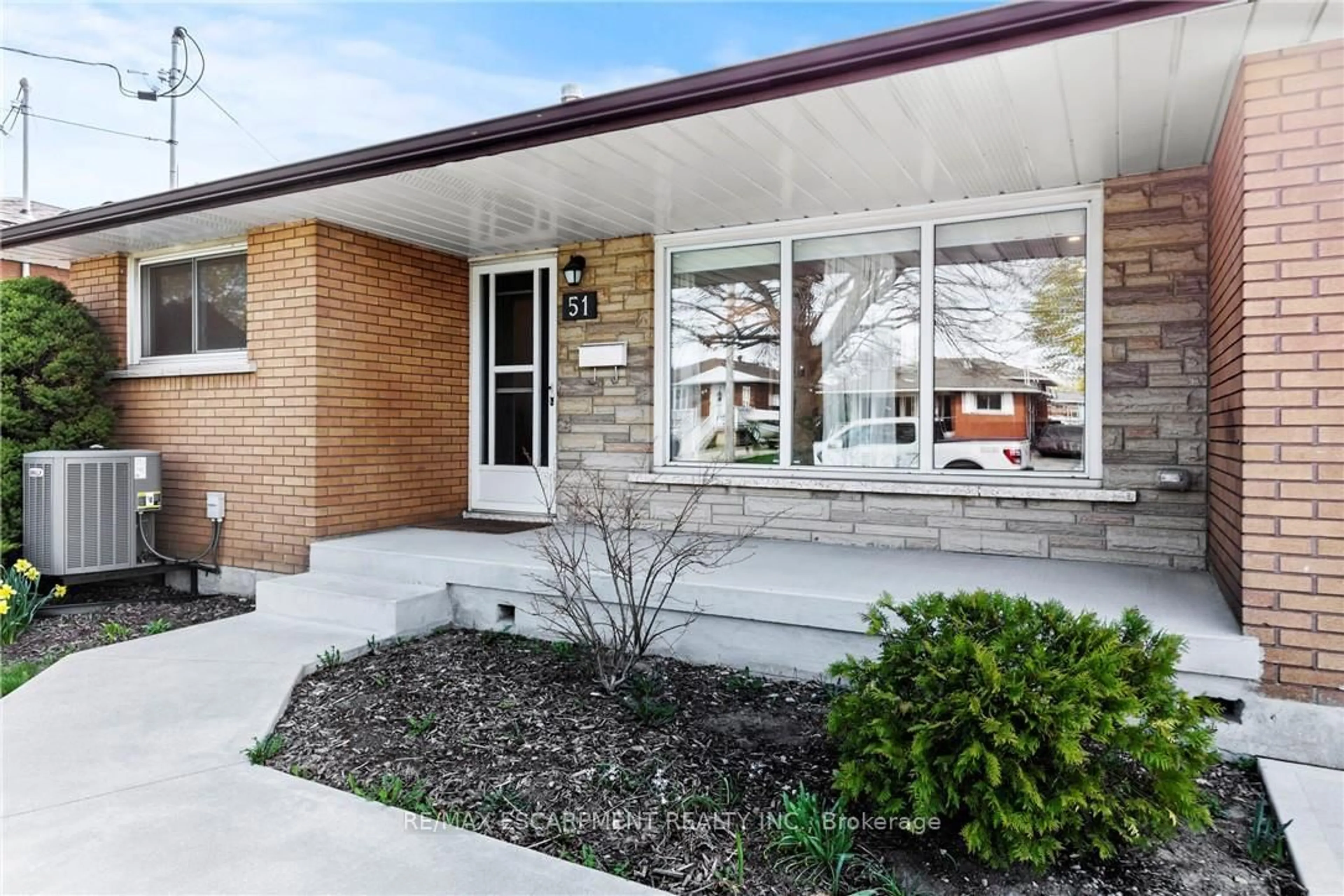 Home with brick exterior material, street for 51 Moxley Dr, Hamilton Ontario L8T 3Y6