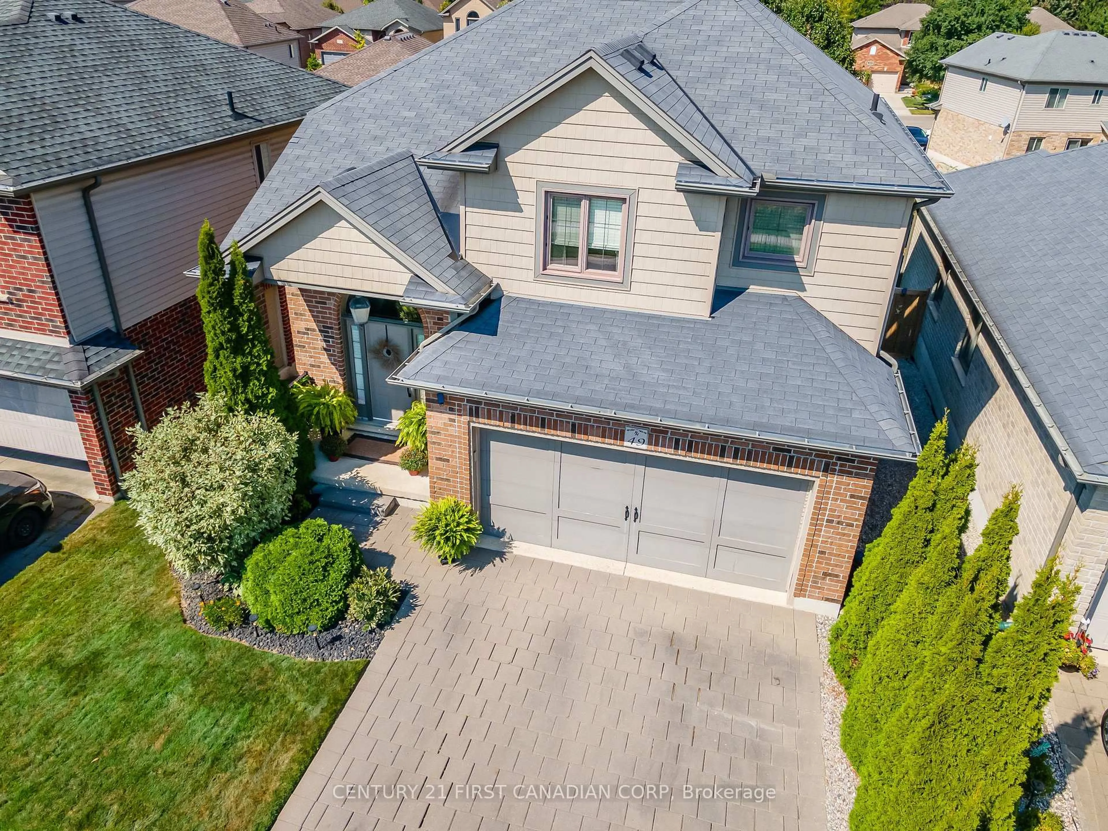 A pic from outside/outdoor area/front of a property/back of a property/a pic from drone, street for 70 TANOAK Dr #49, London North Ontario N6G 5R3