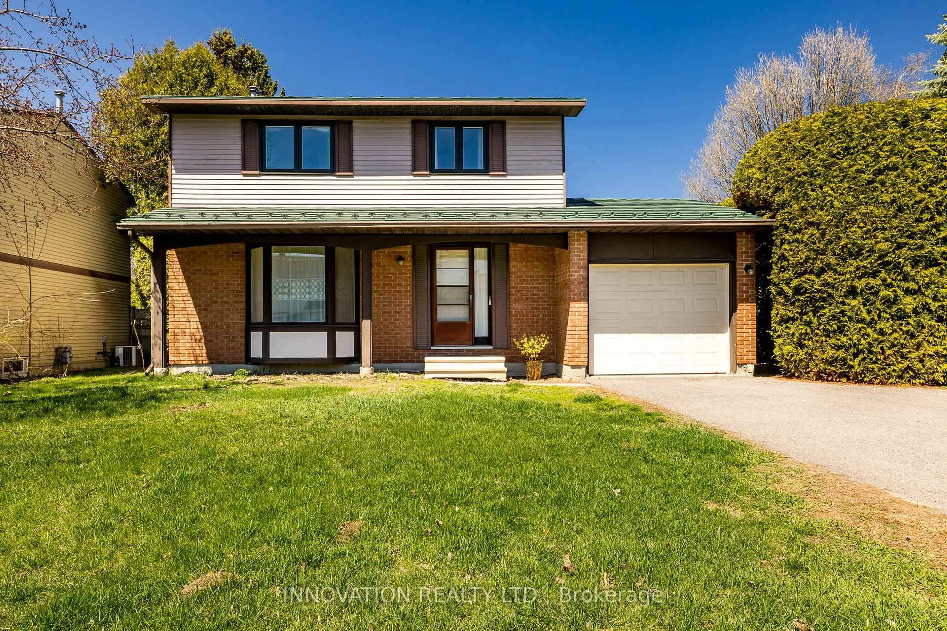 Home with brick exterior material, street for 15 Scharf Lane, Kanata Ontario K2L 2K3
