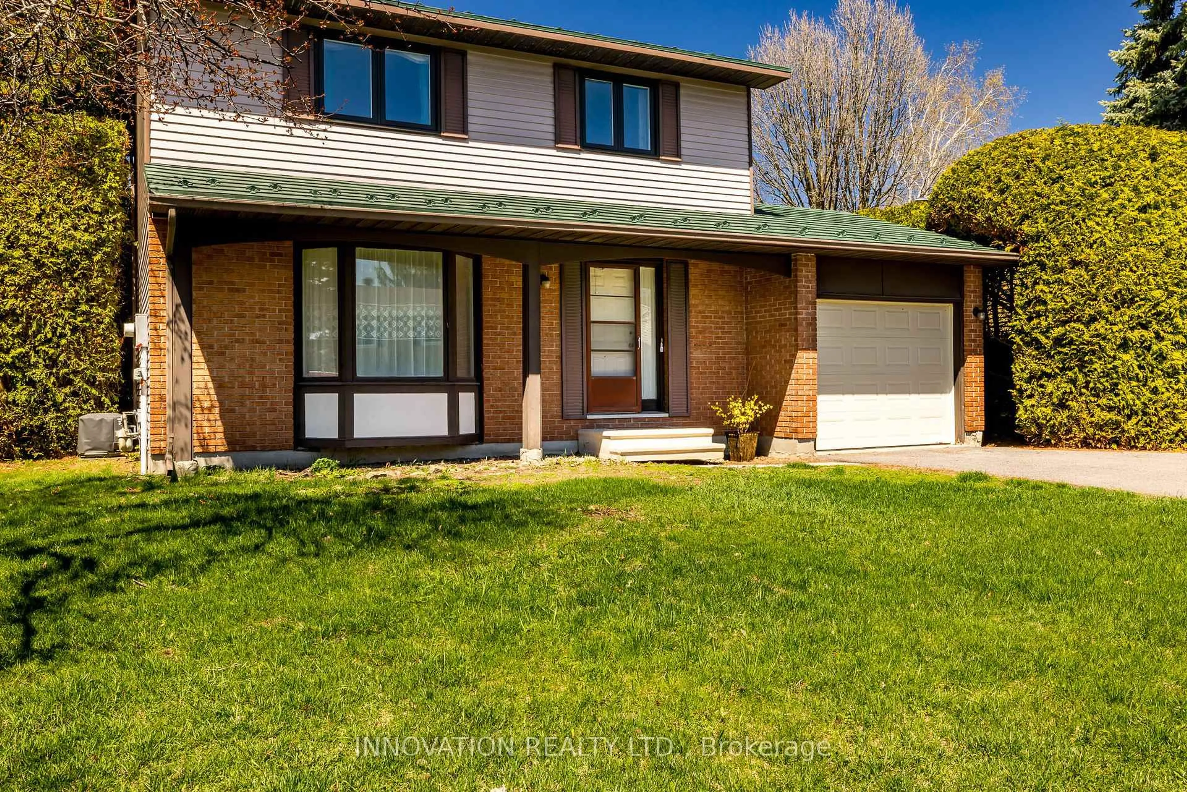 Home with brick exterior material, street for 15 Scharf Lane, Kanata Ontario K2L 2K3