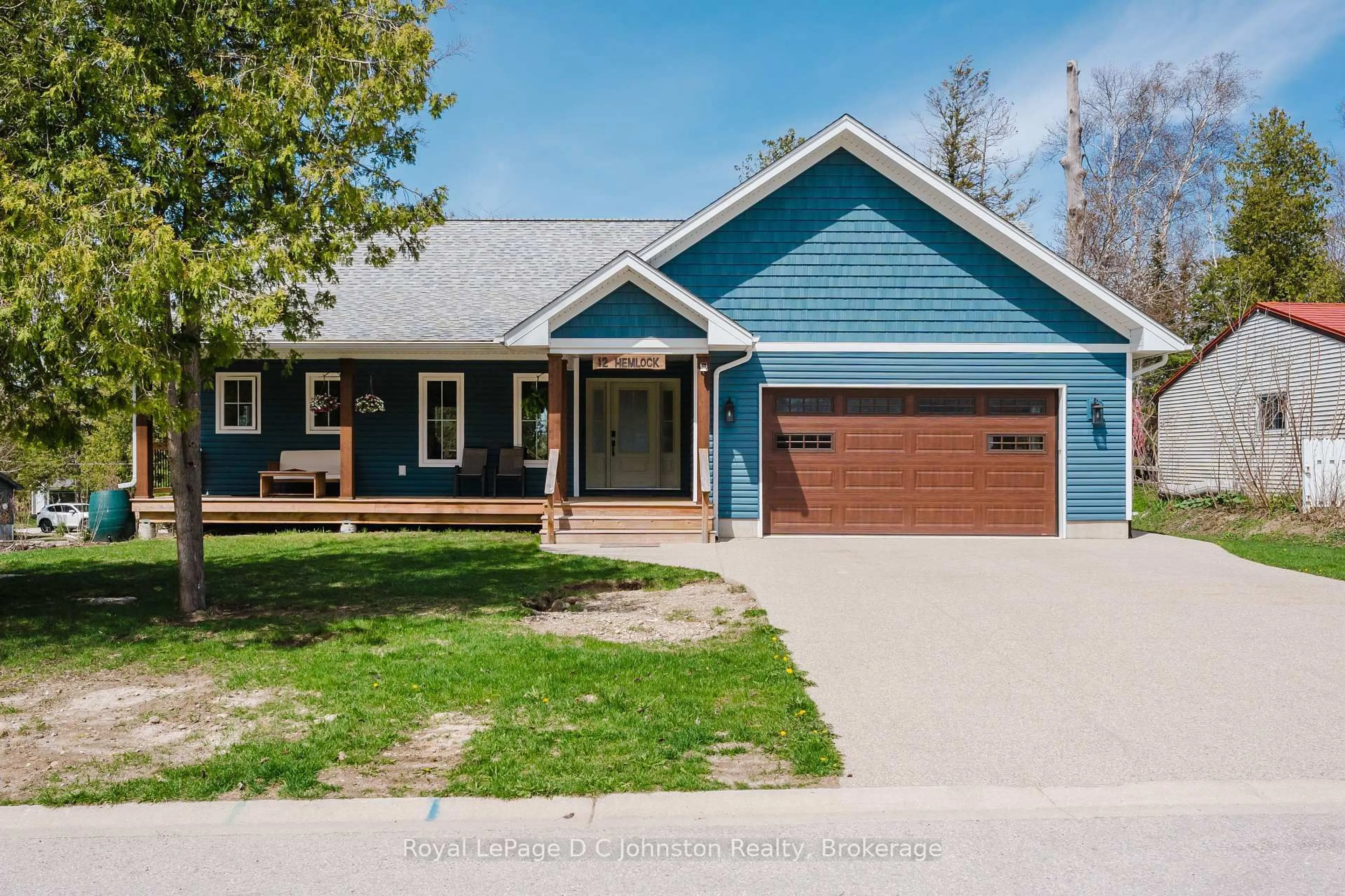 Home with vinyl exterior material, street for 12 Hemlock St, Saugeen Shores Ontario N0H 2L0