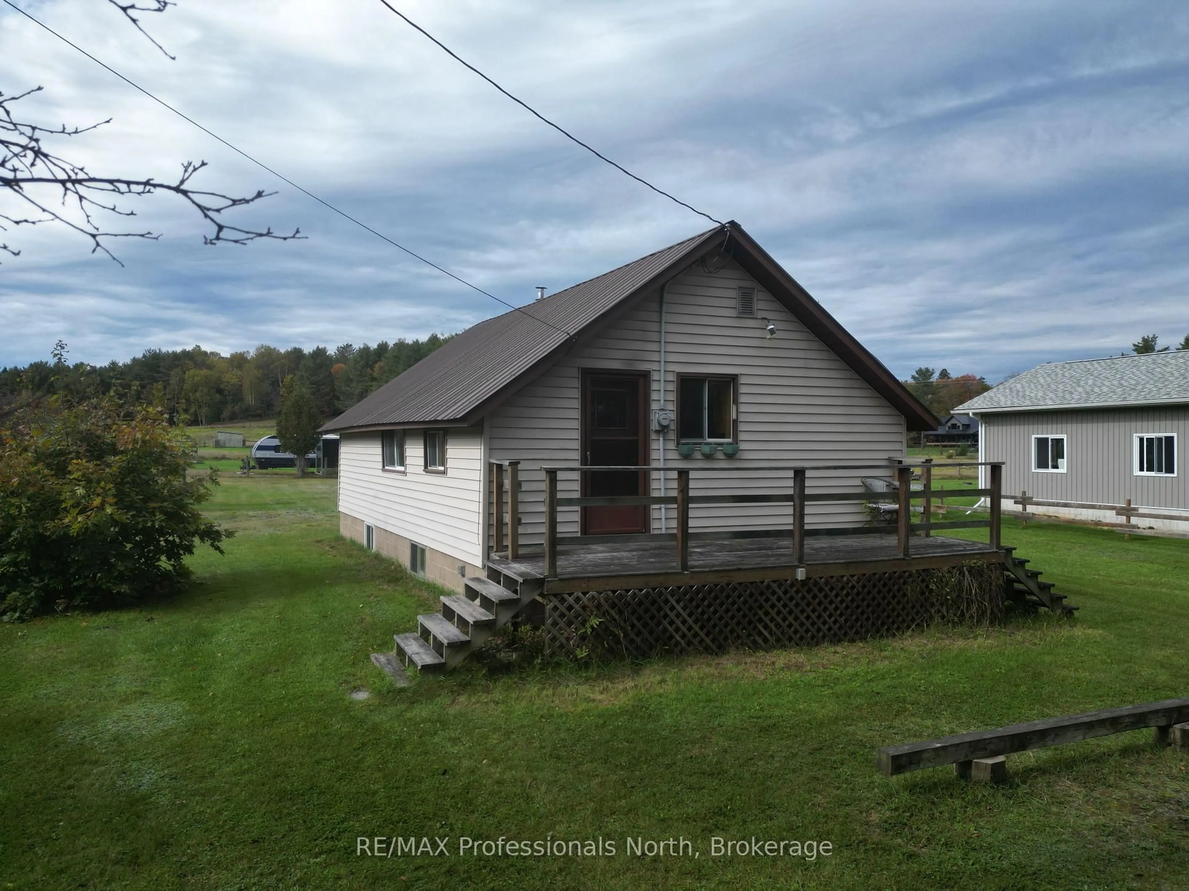 A pic from outside/outdoor area/front of a property/back of a property/a pic from drone, unknown for 449 Bobcaygeon Rd, Minden Hills Ontario K0M 2K0