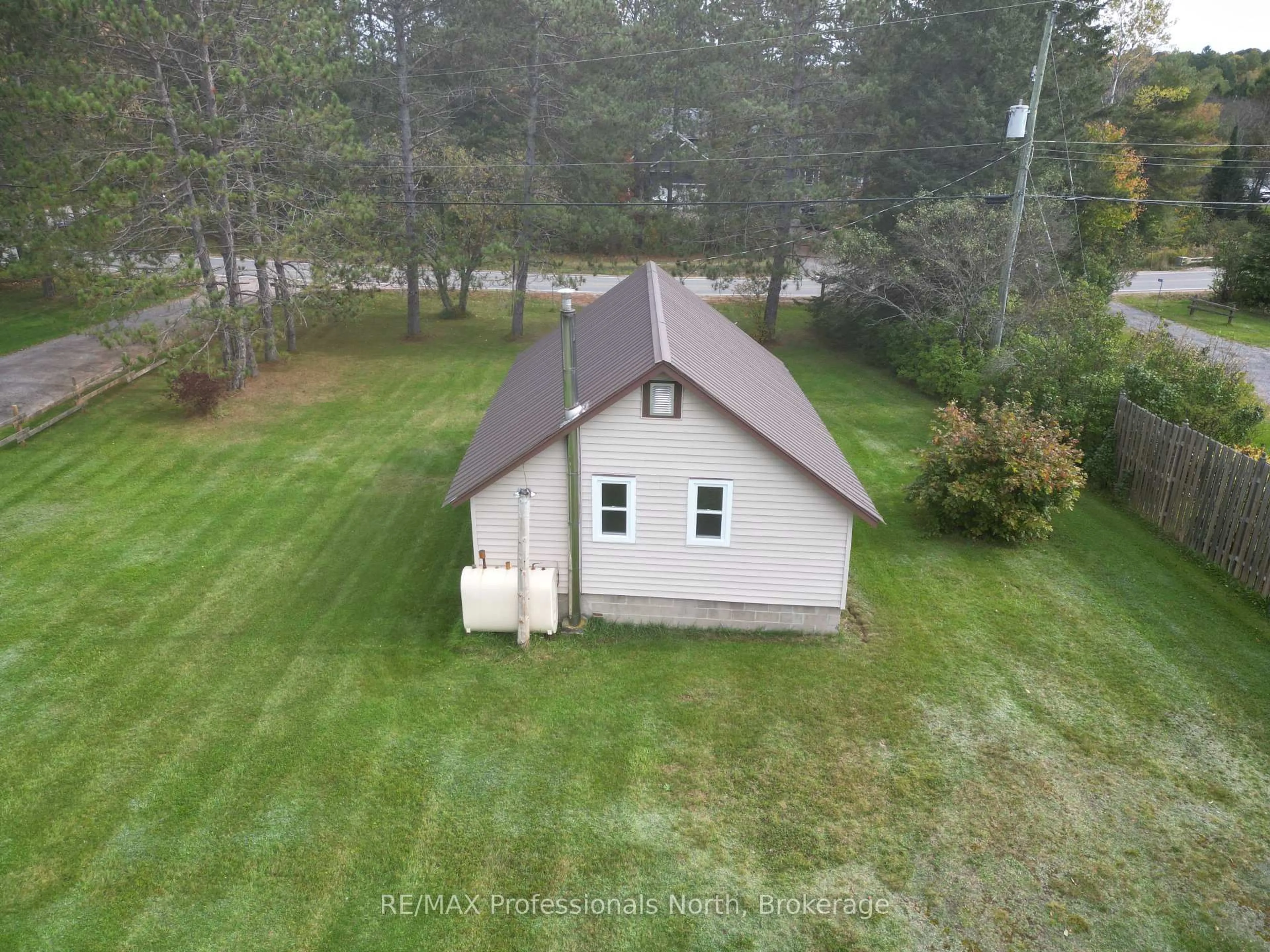 A pic from outside/outdoor area/front of a property/back of a property/a pic from drone, building for 449 Bobcaygeon Rd, Minden Hills Ontario K0M 2K0