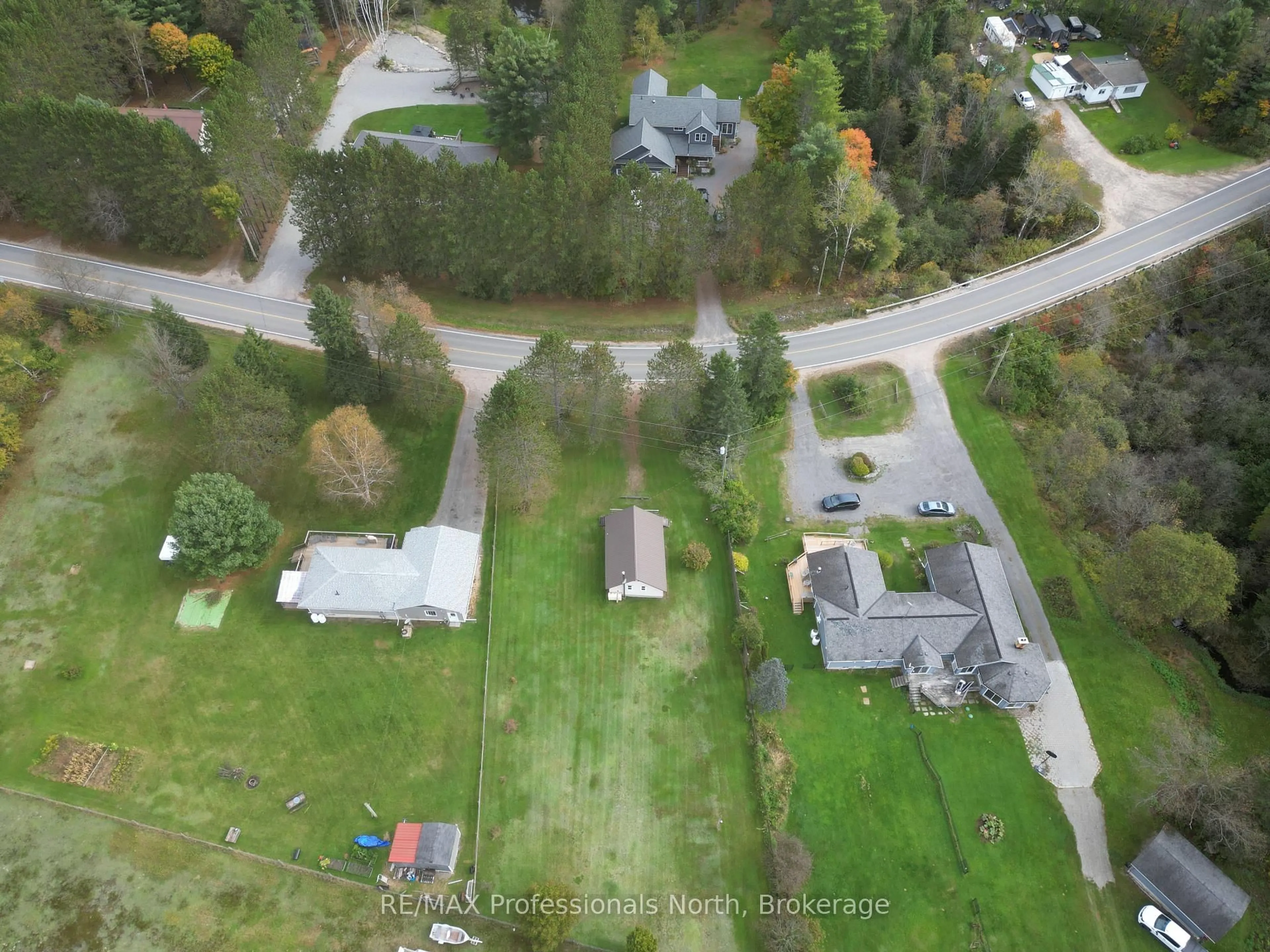 A pic from outside/outdoor area/front of a property/back of a property/a pic from drone, unknown for 449 Bobcaygeon Rd, Minden Hills Ontario K0M 2K0