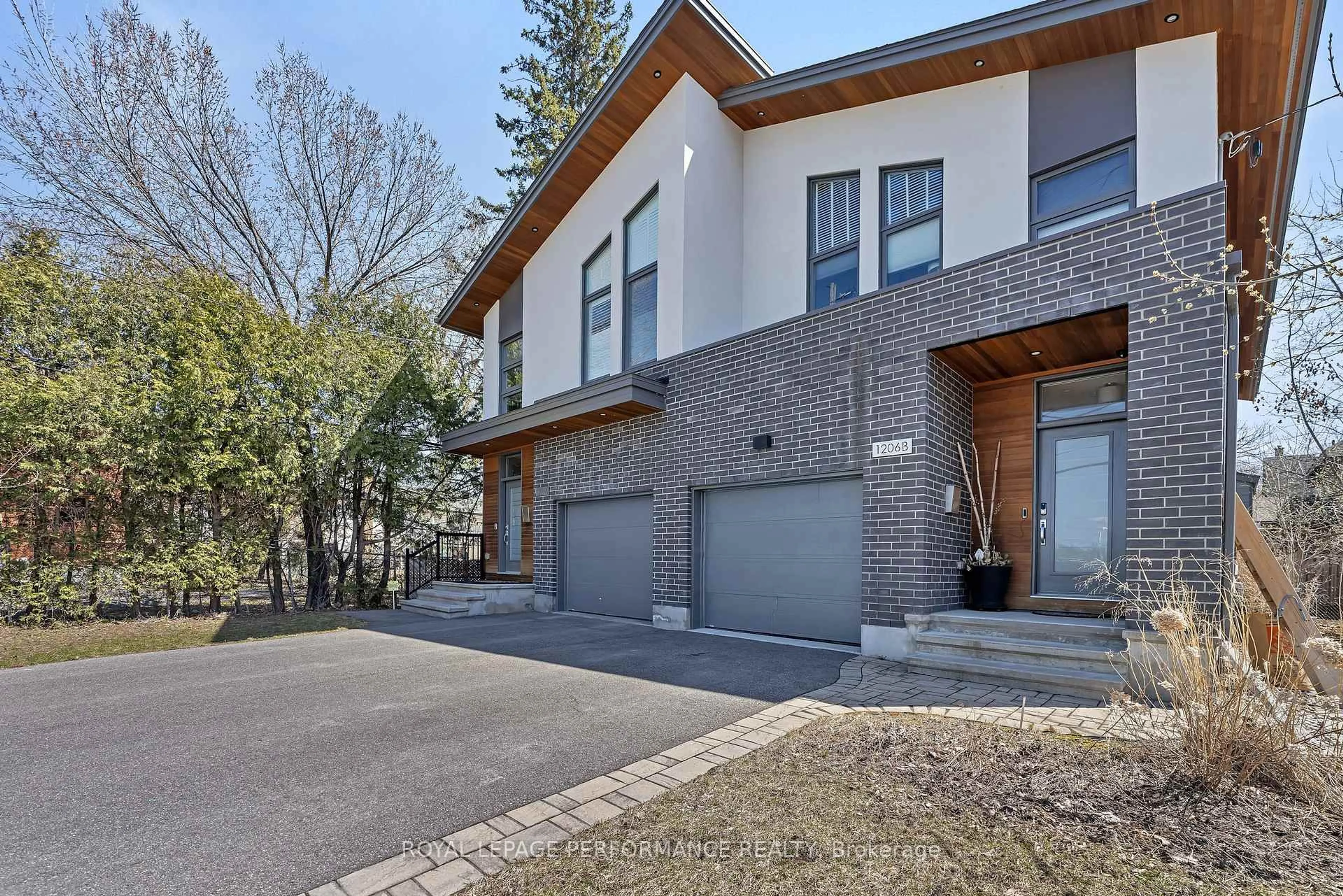 Home with brick exterior material, street for 1206 Byron Ave #B, Ottawa Ontario K2B 6T6