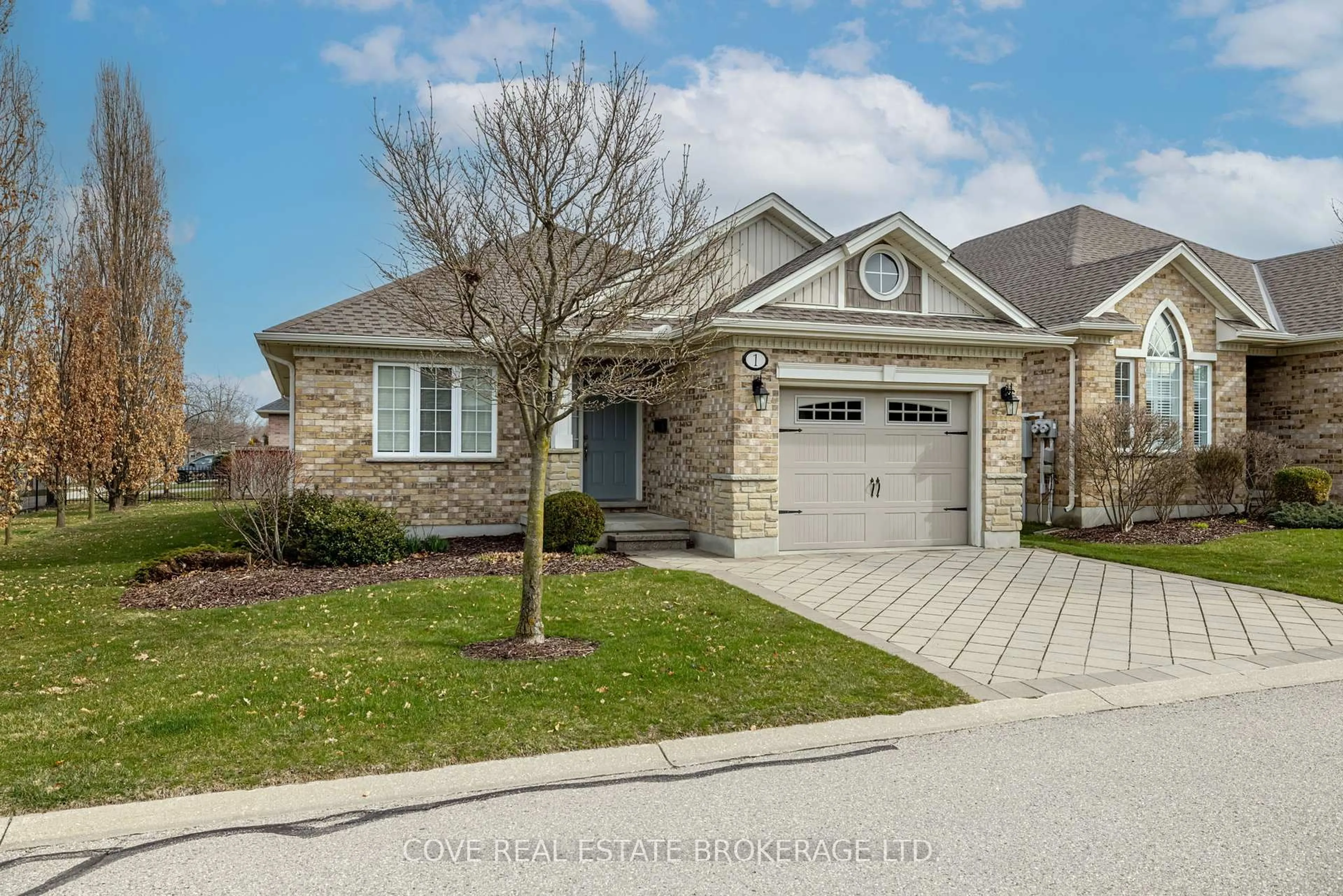 Home with brick exterior material, street for 45 Lake Margaret Tr #1, St. Thomas Ontario N5R 6M5