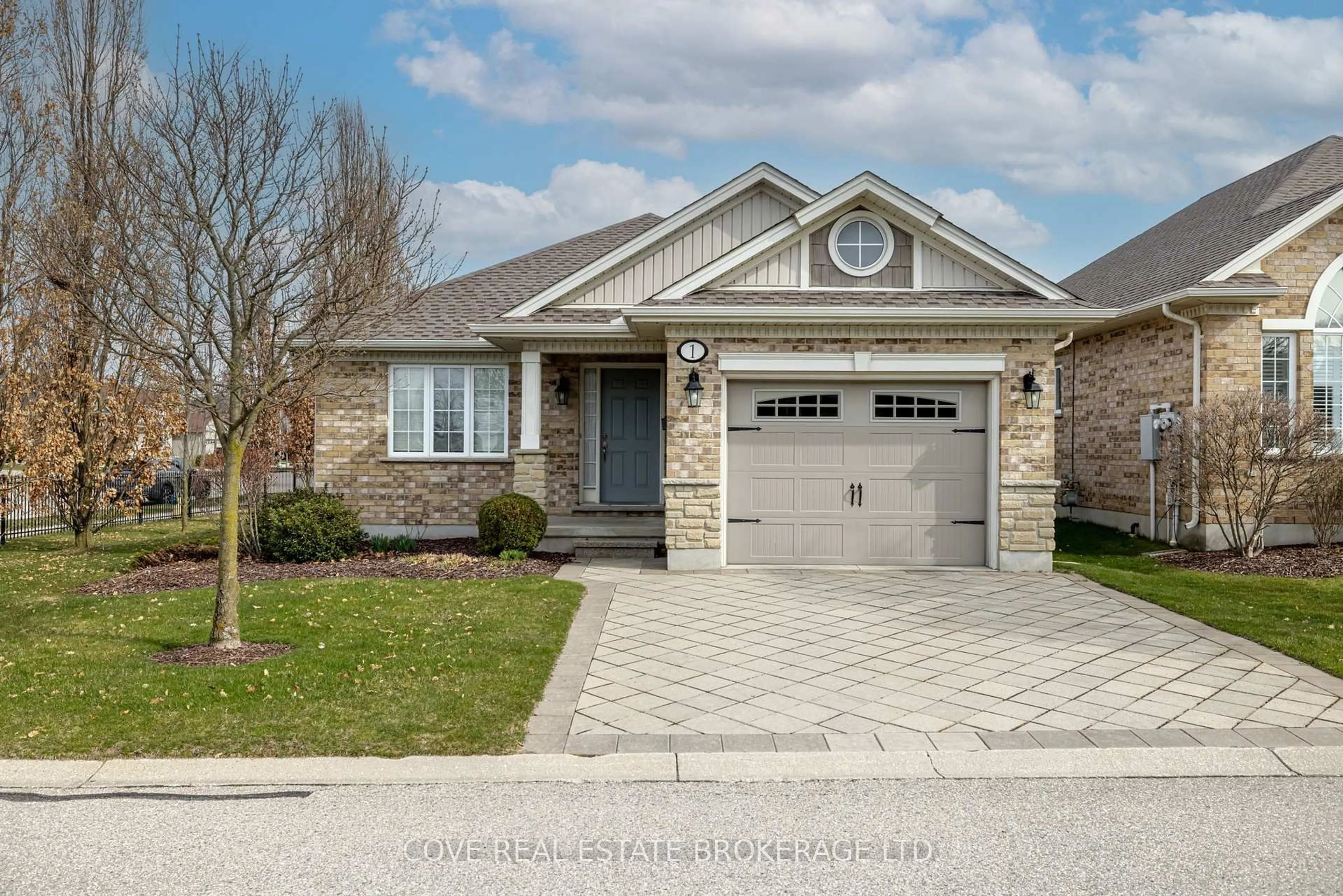 Home with brick exterior material, street for 45 Lake Margaret Tr #1, St. Thomas Ontario N5R 6M5