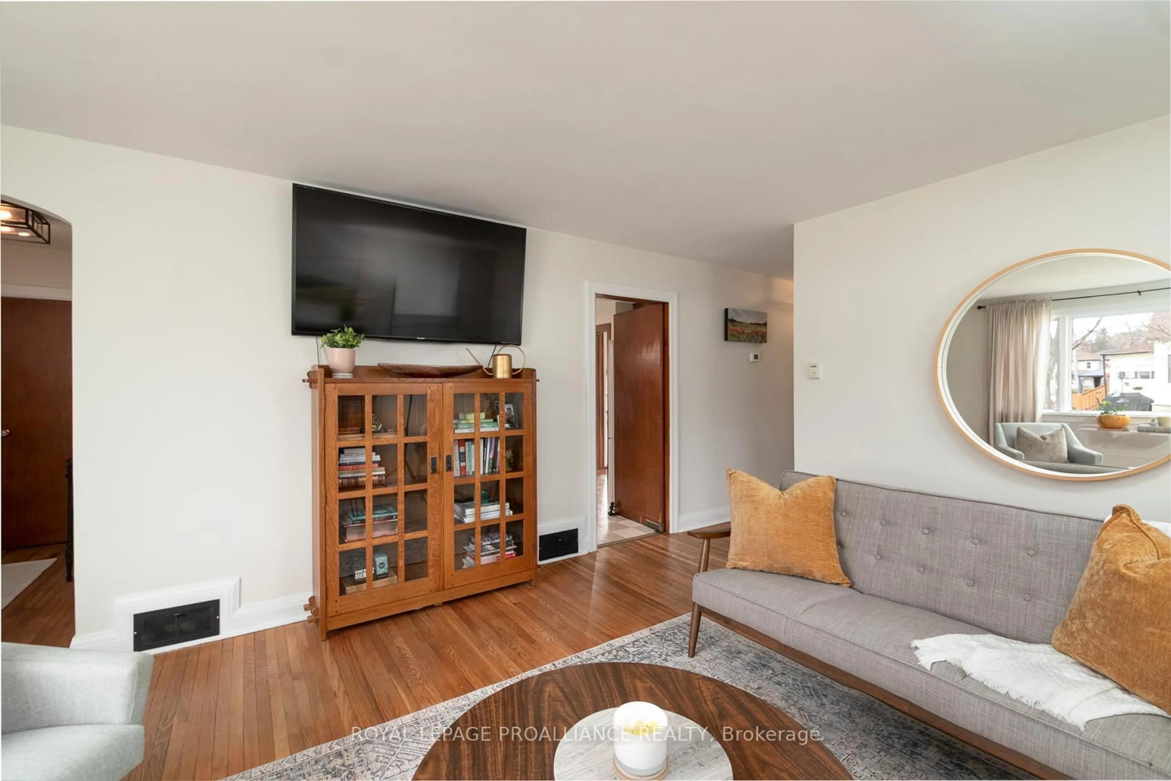 Living room with furniture, wood/laminate floor for 161 Shuter St, Quinte West Ontario K8V 3L9