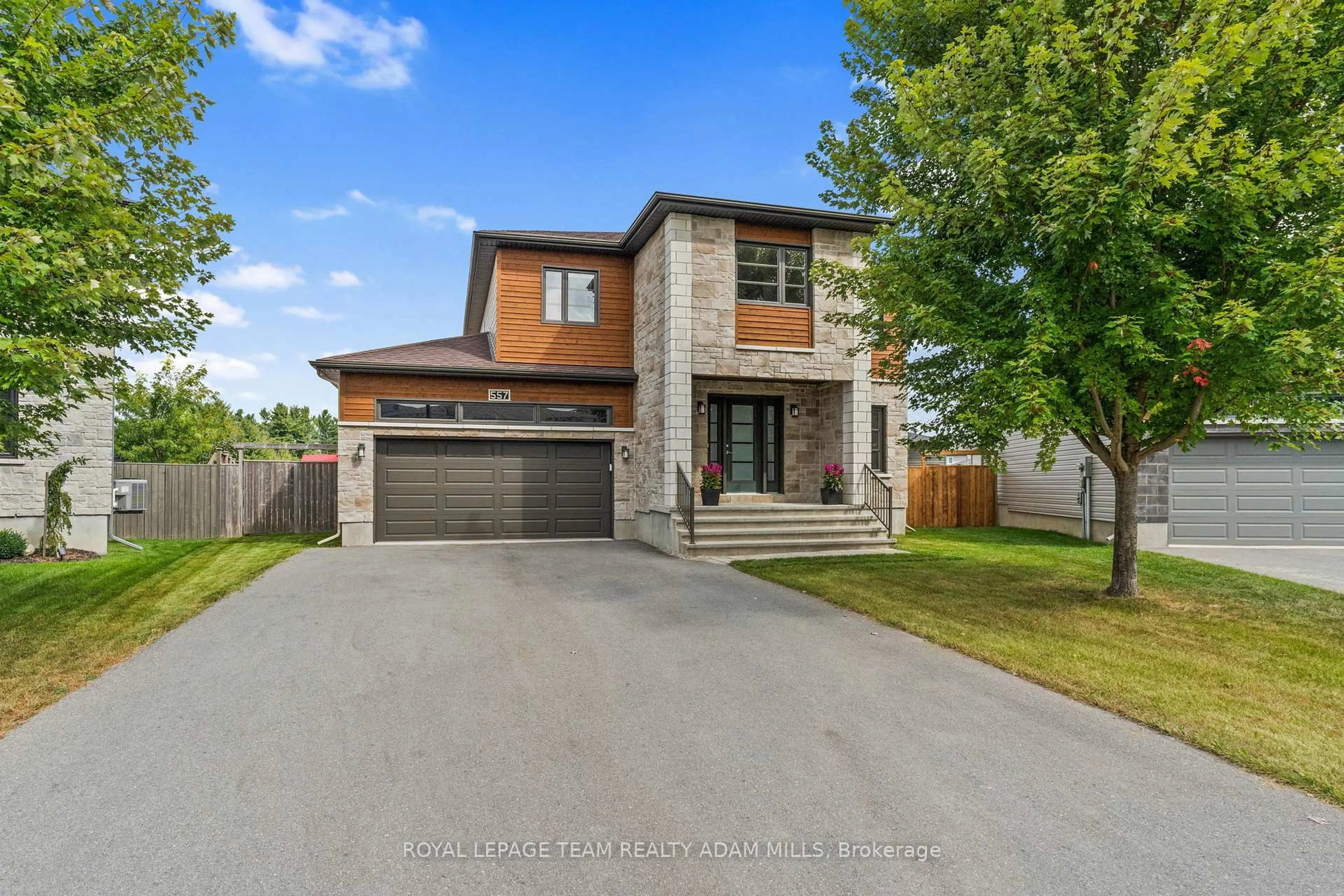 Home with brick exterior material, street for 557 Marseille St, Russell Ontario K0A 1W0