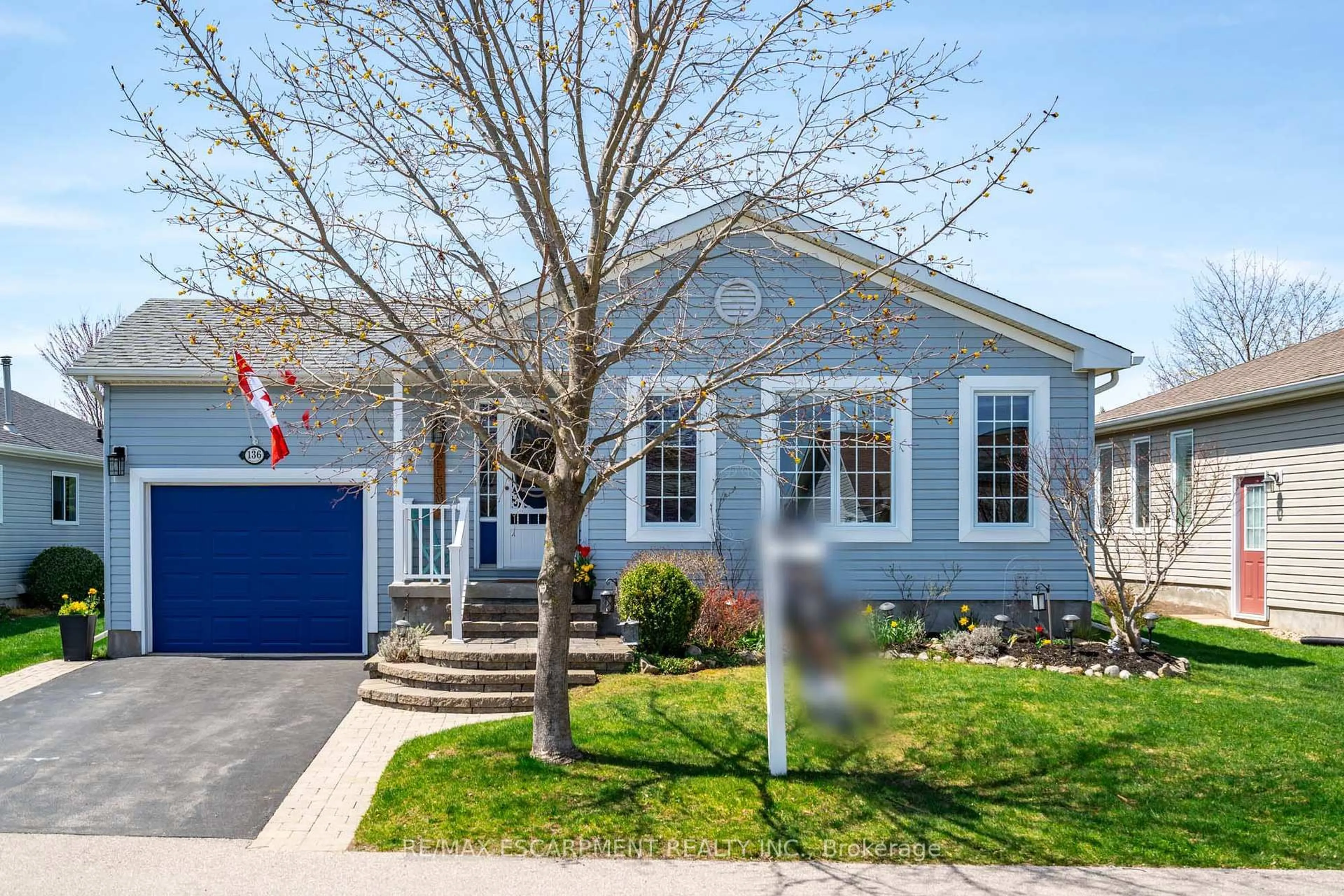 Home with vinyl exterior material, street for 136 Glenariff Dr, Hamilton Ontario L8B 1A5