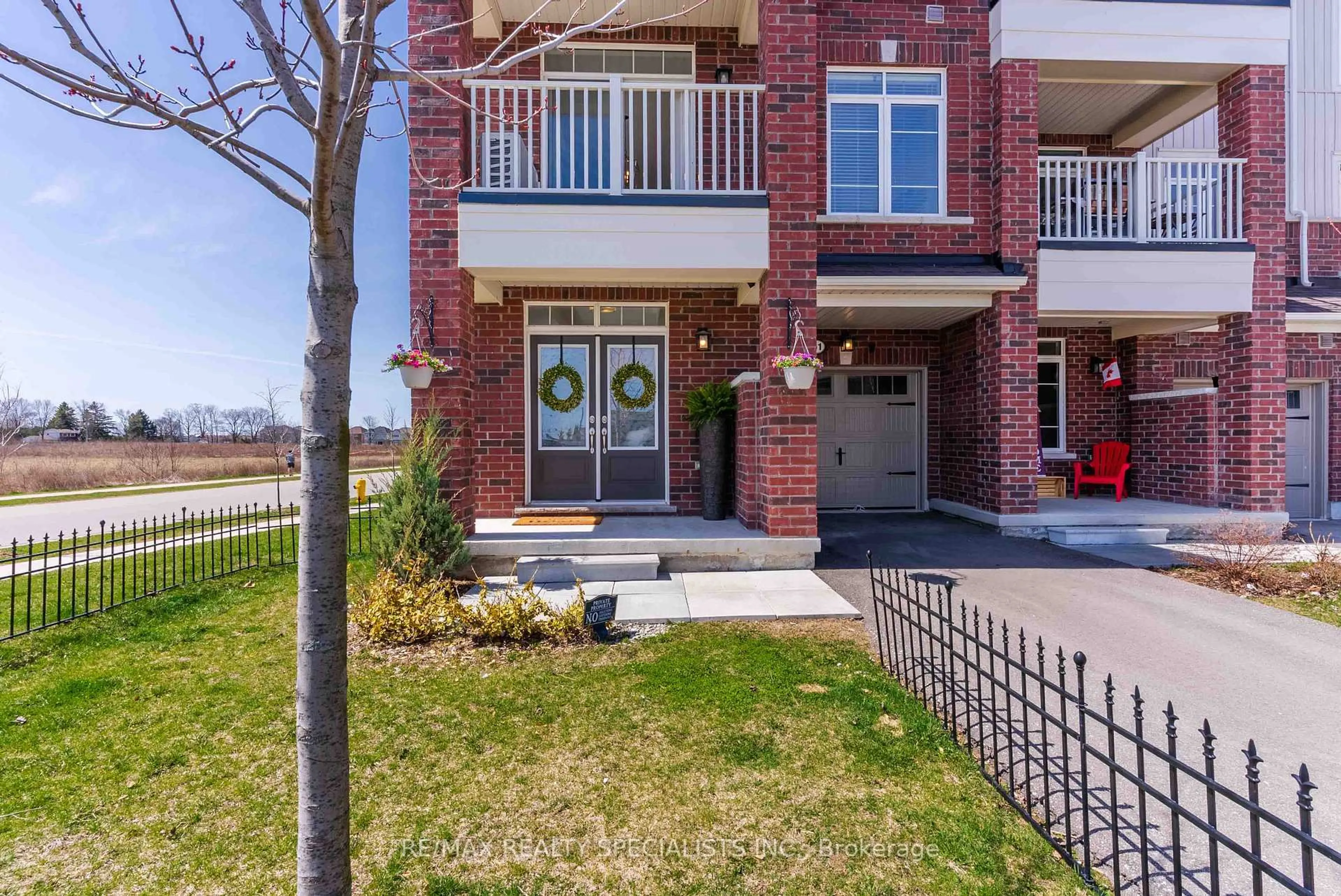 Home with brick exterior material, street for 113 Hartley Ave #61, Brant Ontario N3L 0K8
